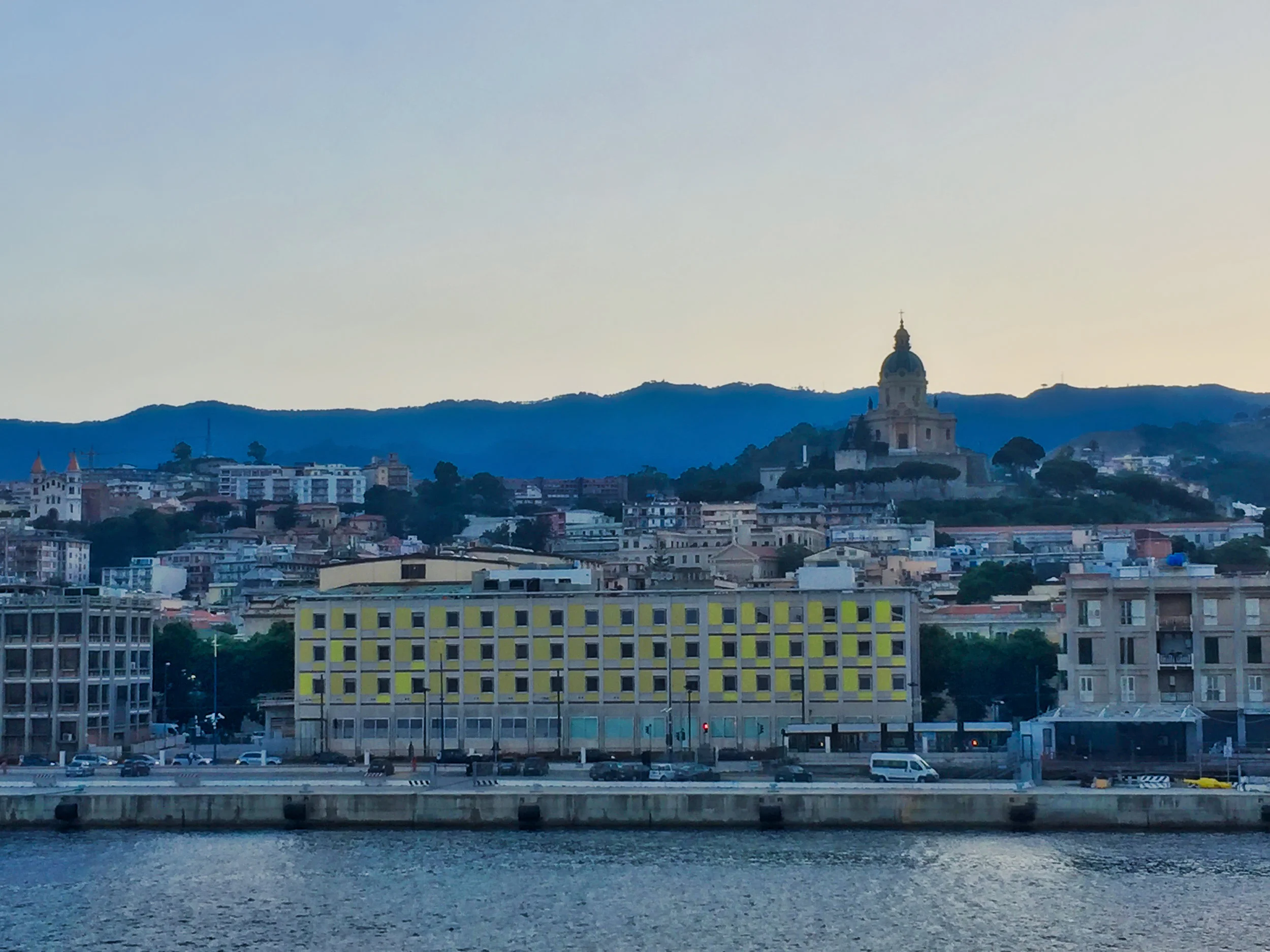  Yumi raced out of the boat dining room onto the deck to take this photo as we left port. 