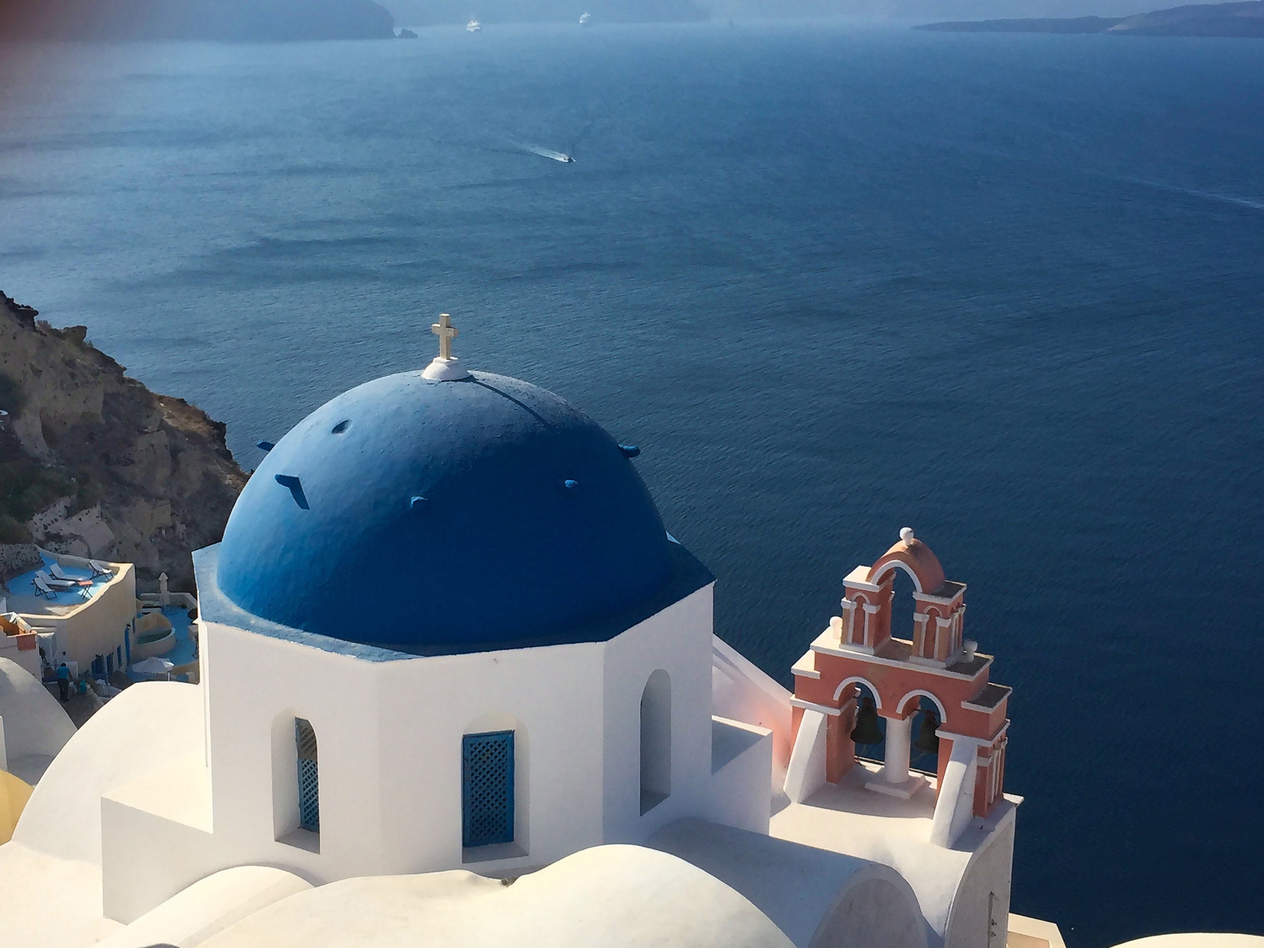  Everyone takes a photo of this spot in Oia but  only I would take a photo with my finger in the top left corner of the iPhone camera :( 