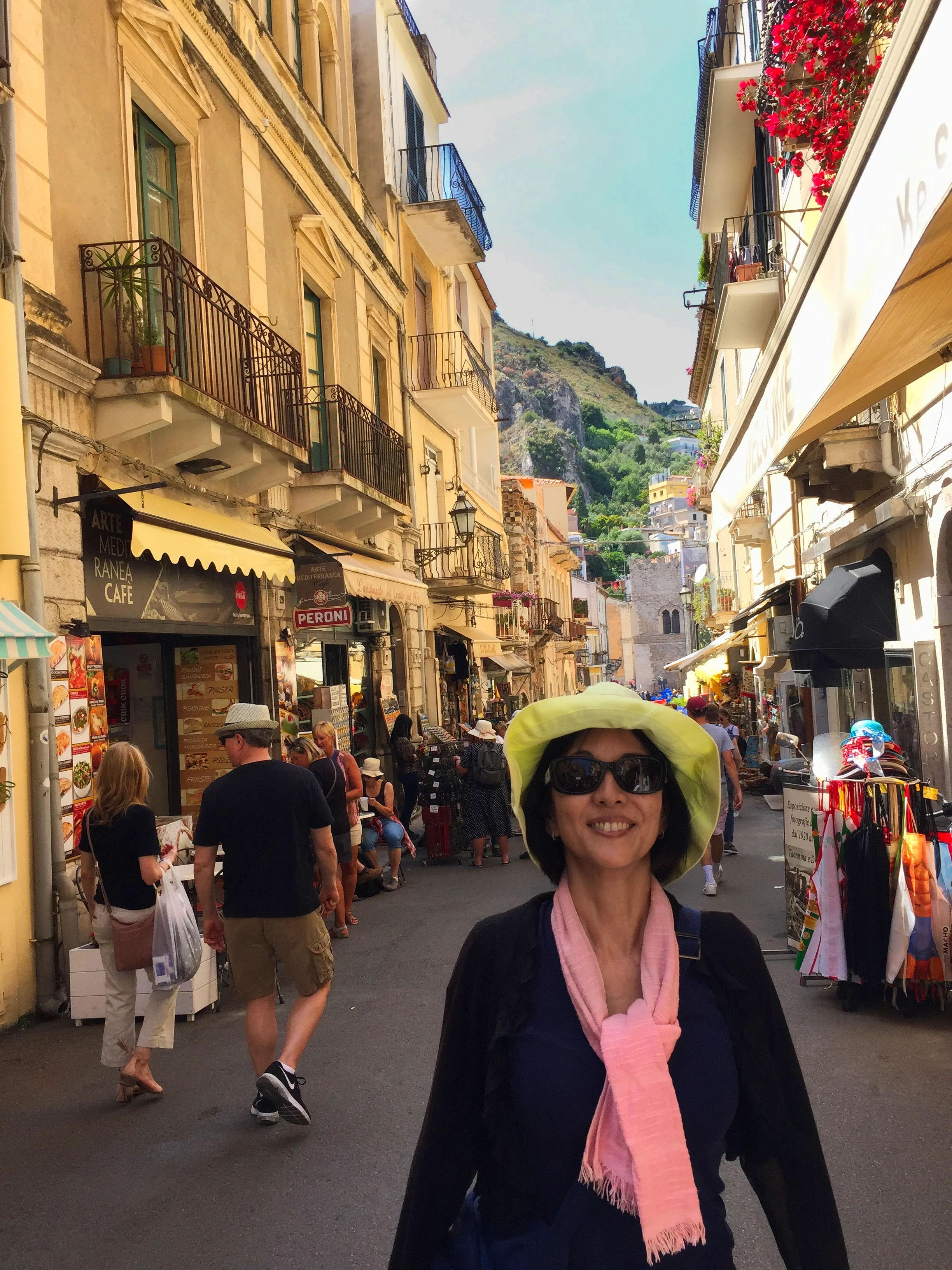  Walking through the shopping area of Taormina to catch the bus and then train back to the port of Messina. 