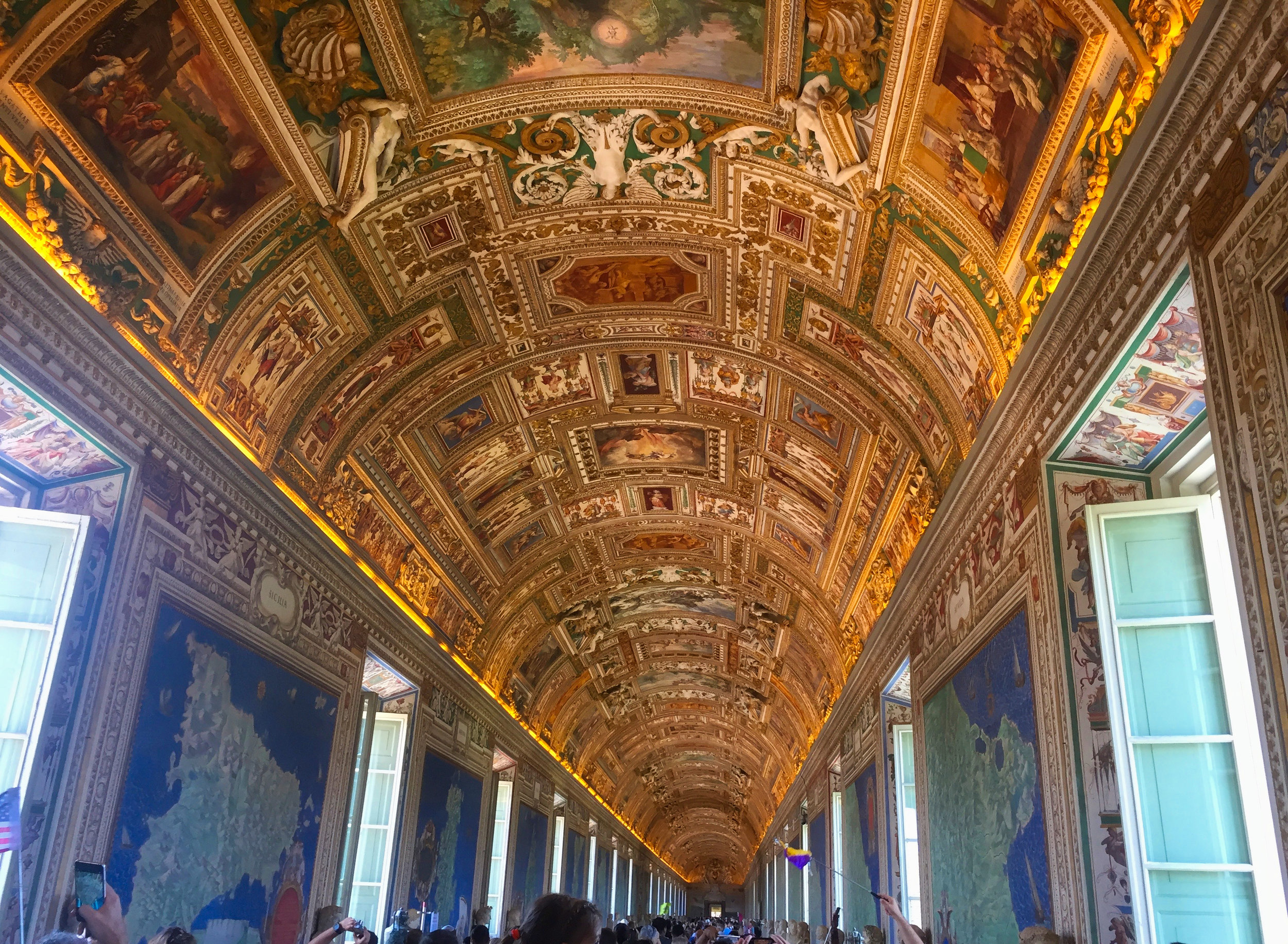  The gallery of Maps of Italy. Just wall to wall people. The flags are so you know where you tour guide is. 