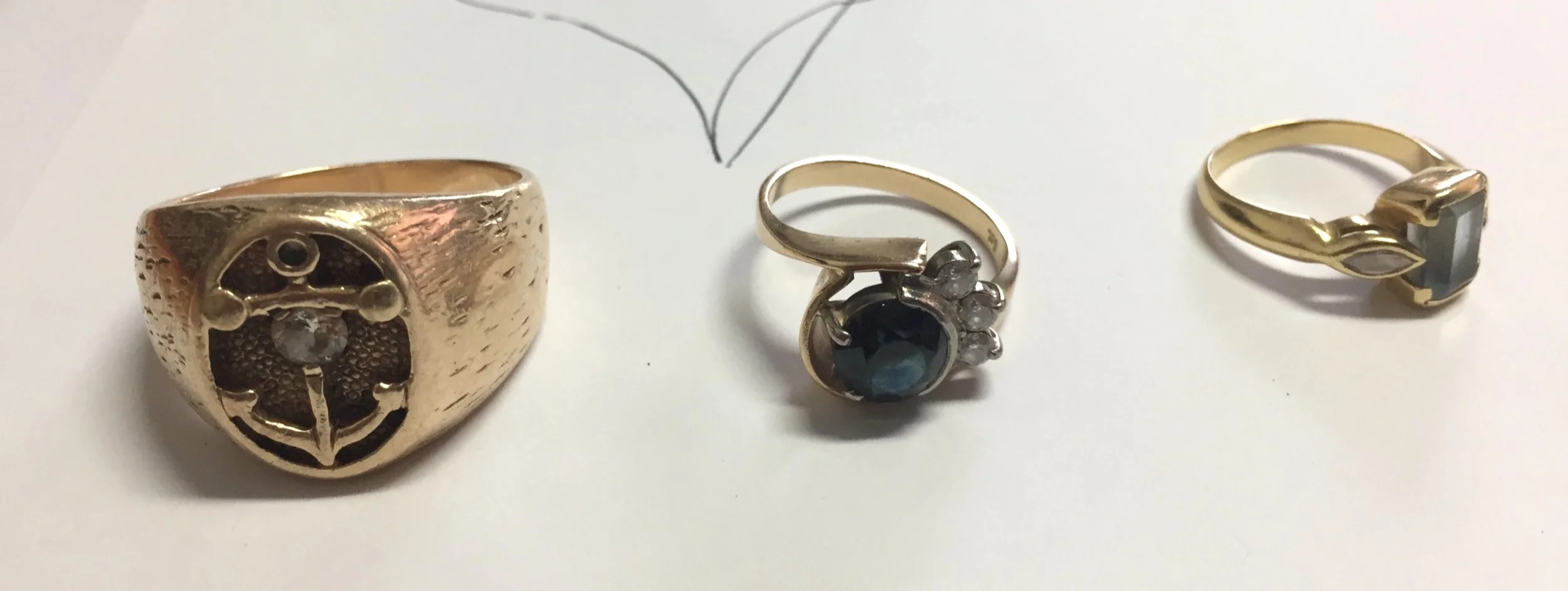 The ring to be remade on the left with some scrap jewellery.