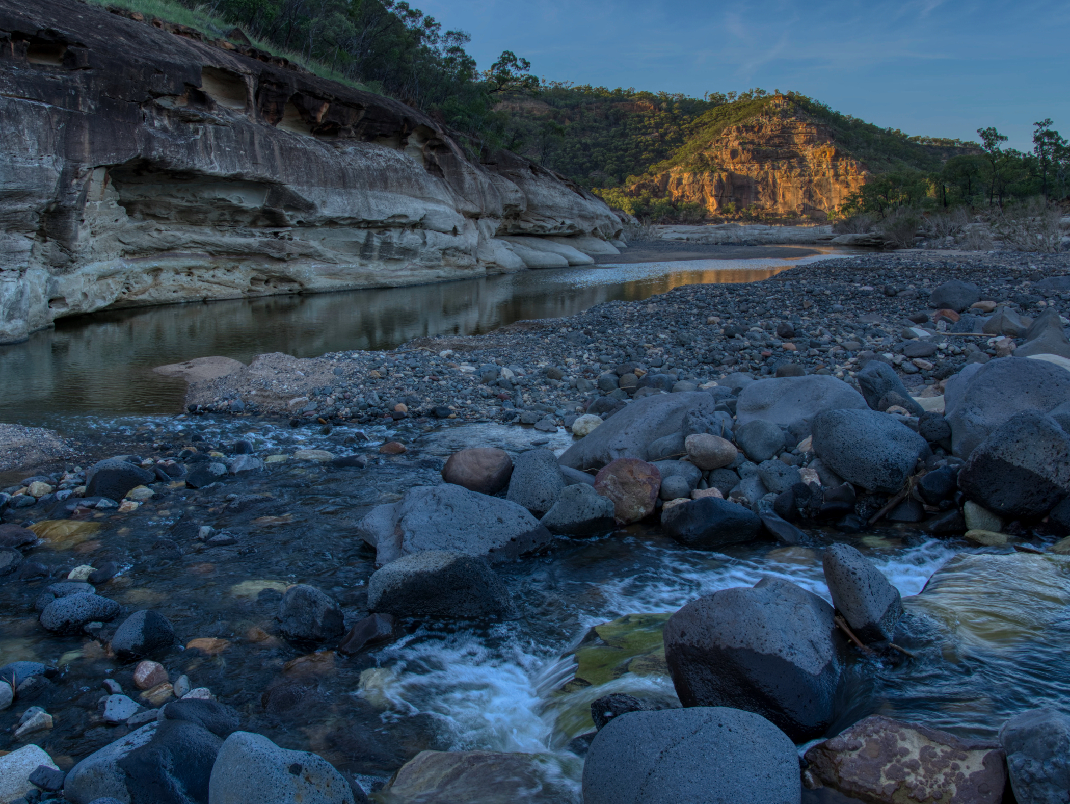 Just after first light with the morning sun cutting through a small creek to the left of the Pyramid.