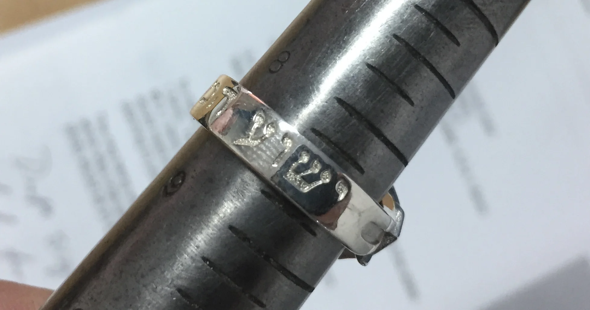 The bottom of the silver draft ring.