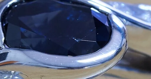 A small chip on the sapphire of a one year old ring