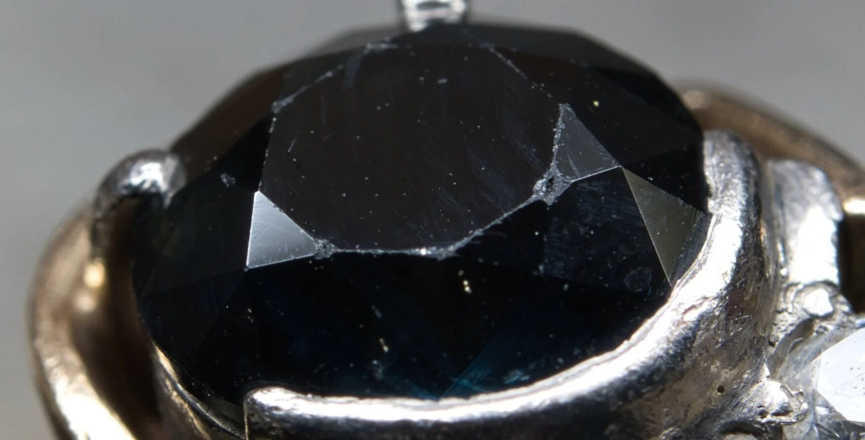 Existing damage to a sapphire in a ring I was asked to remodel