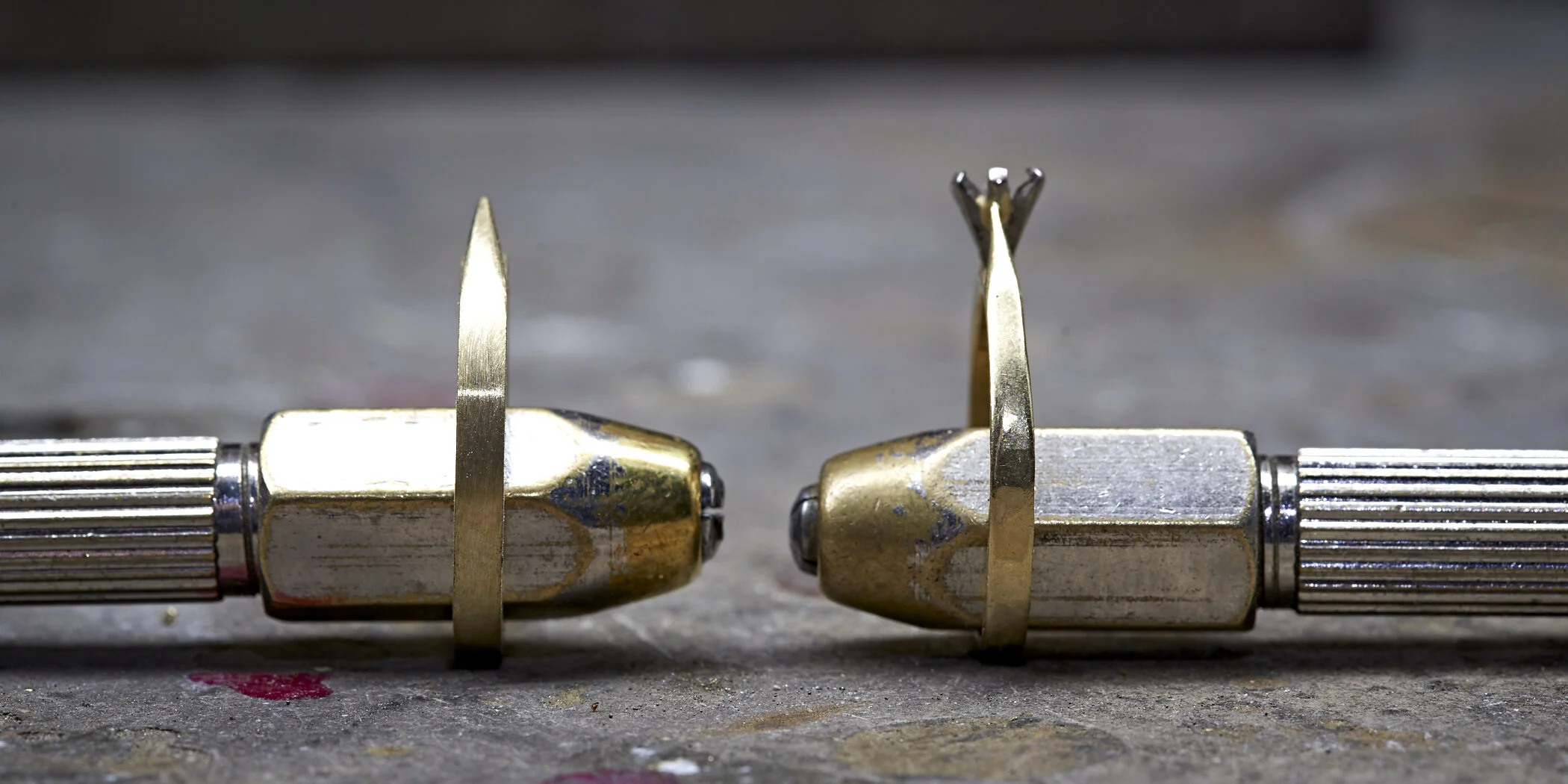 The replacement band on the left would be .2mm wider than the worn ring on the right.