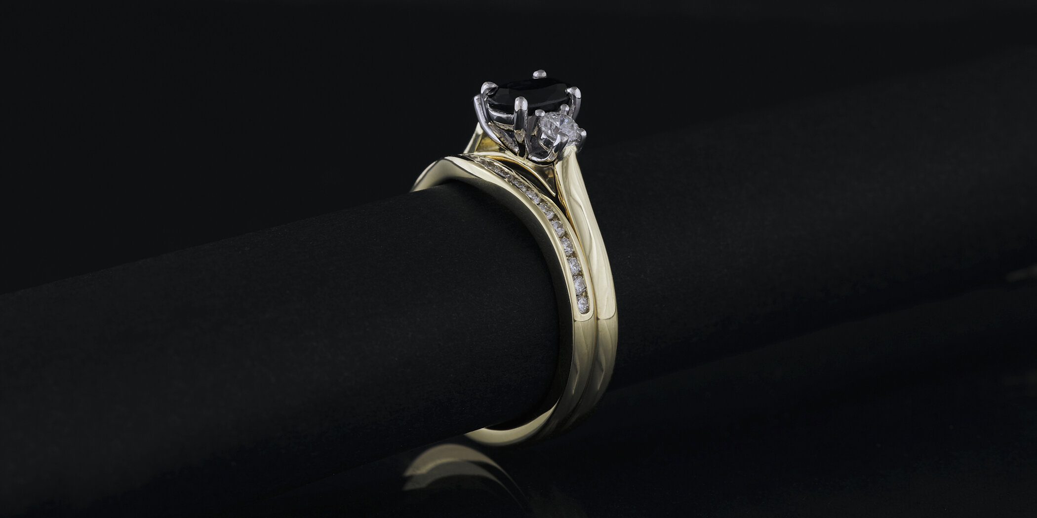  The remade engagement ring with adjustments to allow the wedding ring to sit better. 