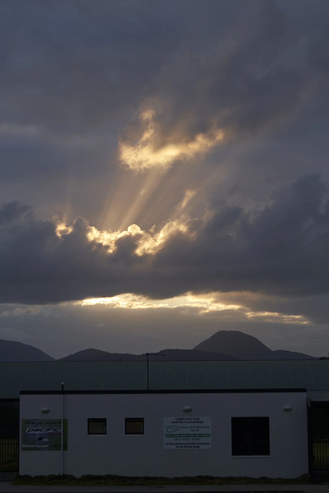 Sun rising over the driving range
