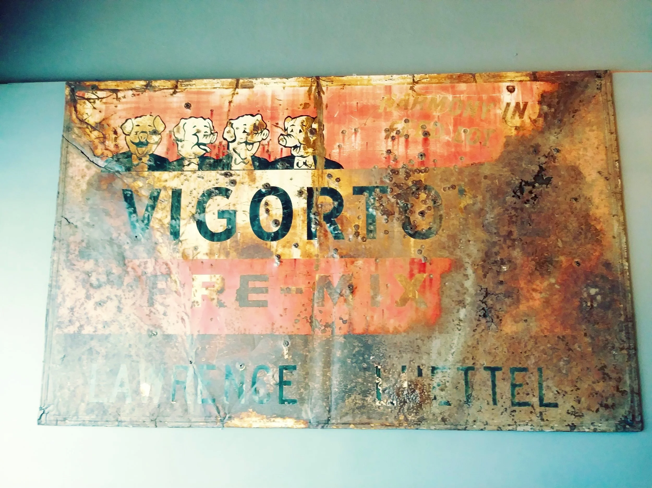 Lawrence Luettel is Greg’s grandfather who sold Vigortone feed for years and that sign sat near his farm on Highway 14 as advertisement.