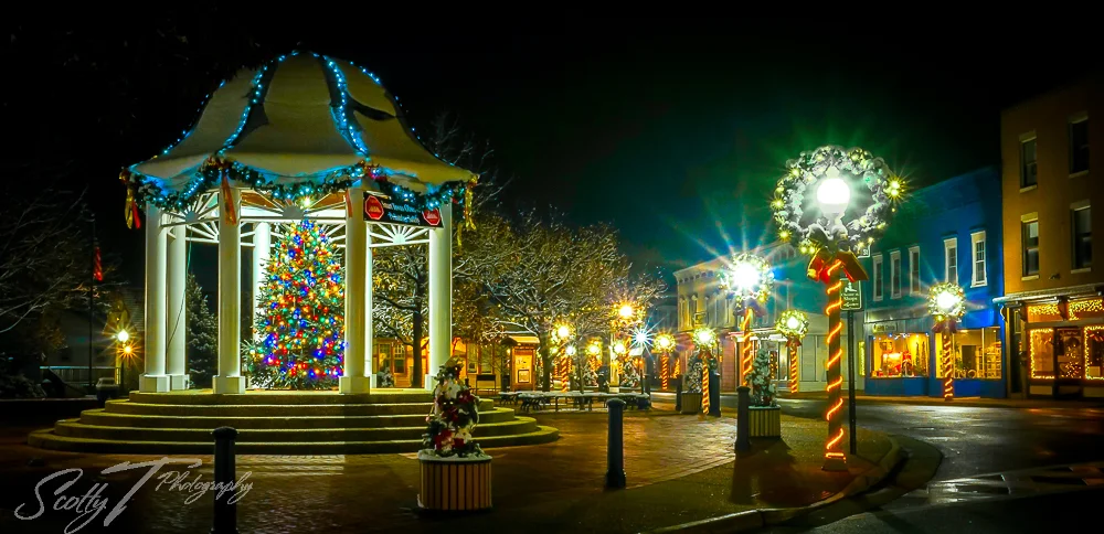 Downtown Front Royal Virginia at night with string lights and historic buildings