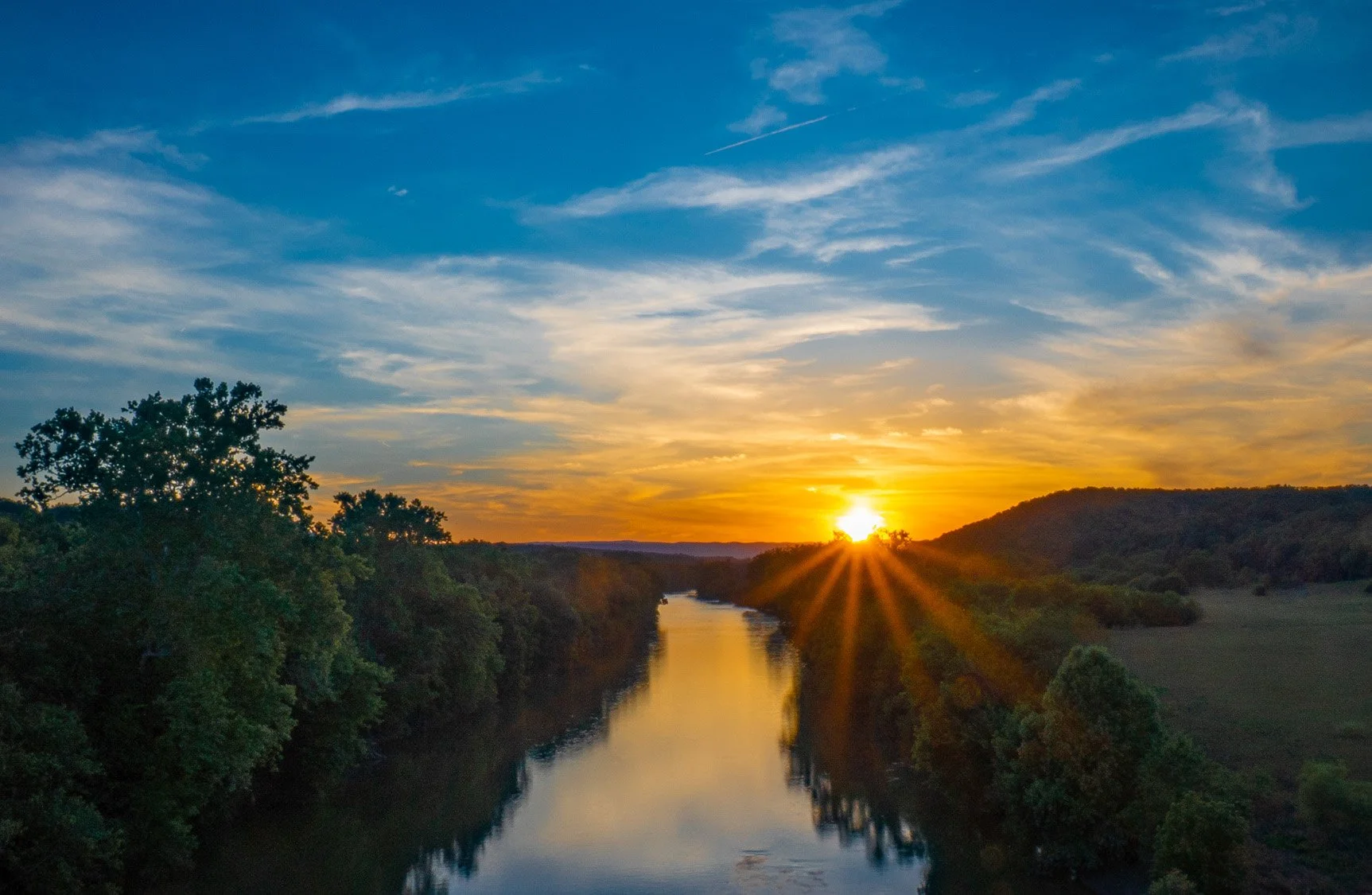 Sunrise over the Shenandoah River near Front Royal Virginia with mountain views