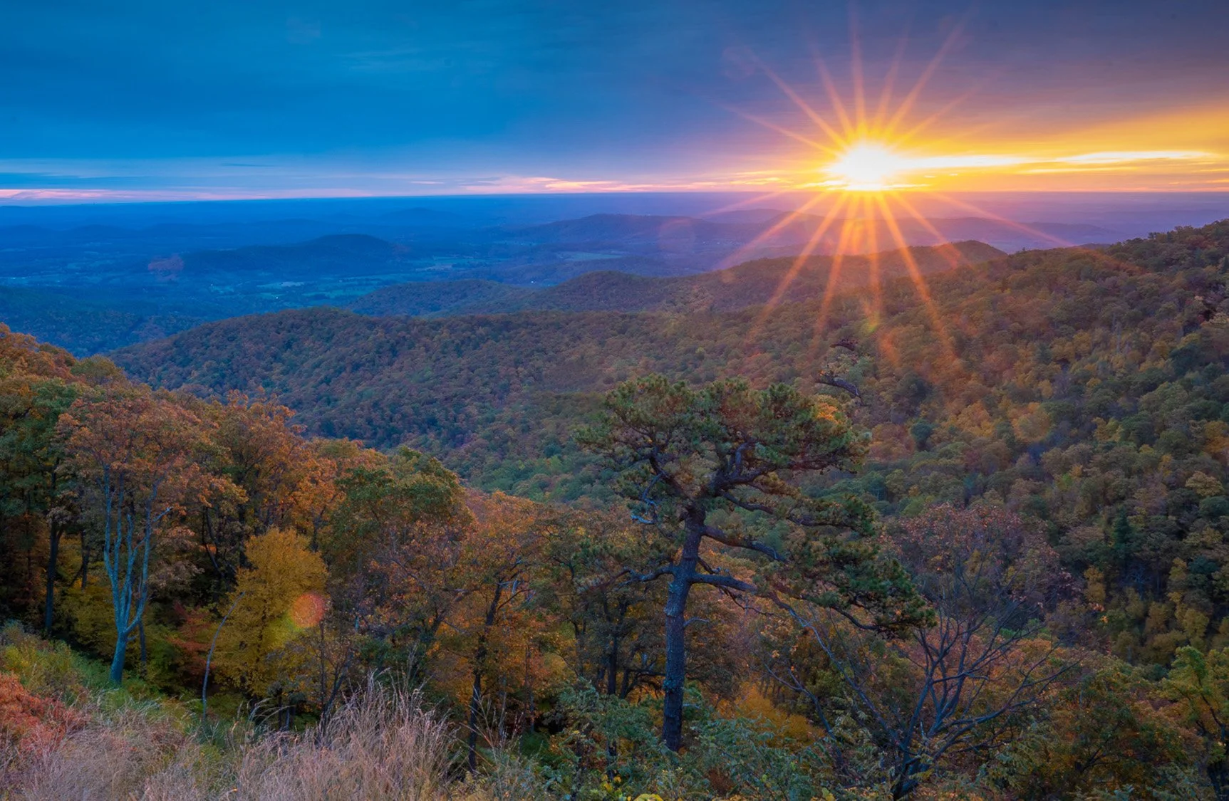Sunrise at Hazel Mountain Overlook along Skyline Drive in Shenandoah National Park with mountain layers and fall foliage