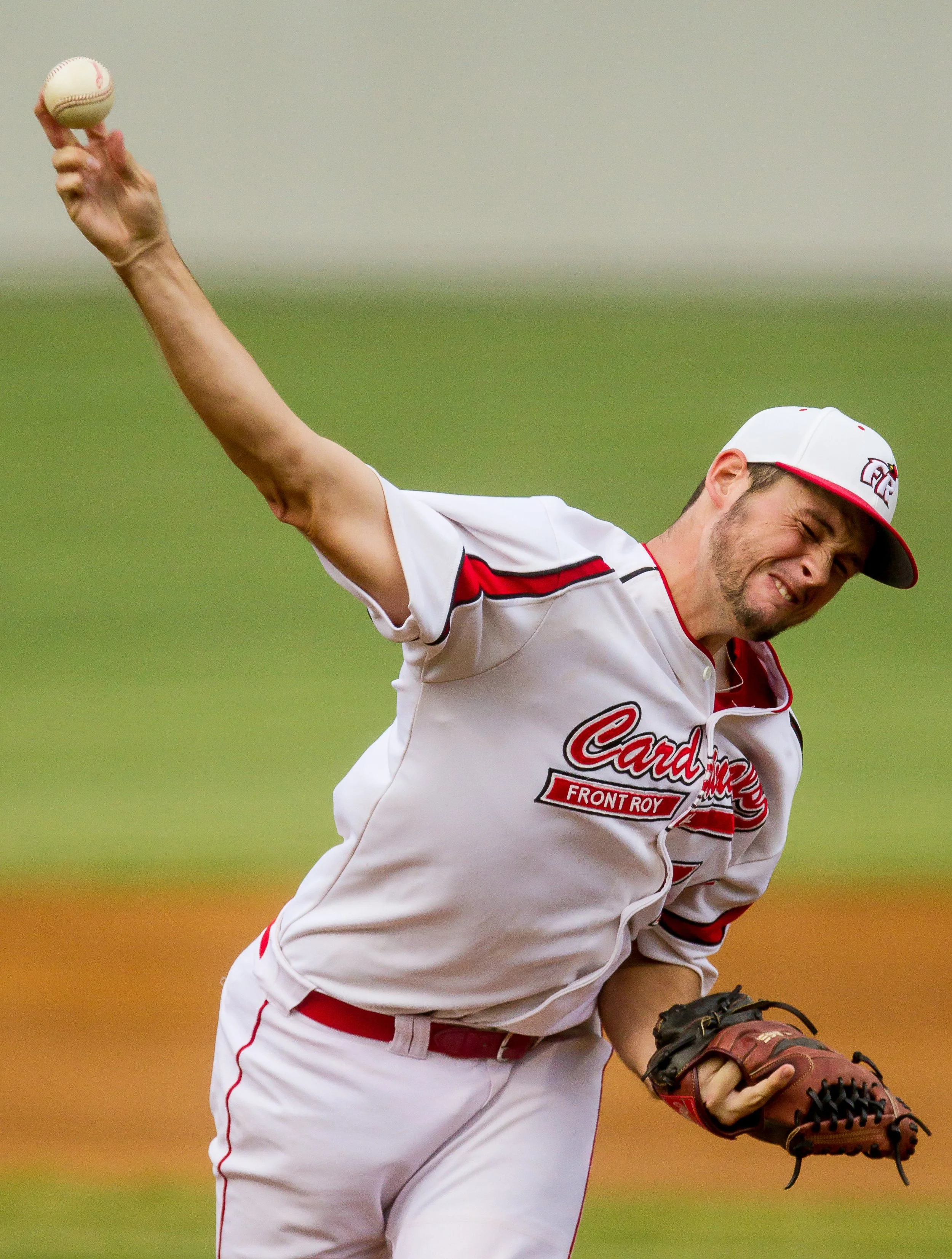 Front Royal Cardinals pitcher throwing a pitch during a summer Valley League baseball game in Front Royal, VA.