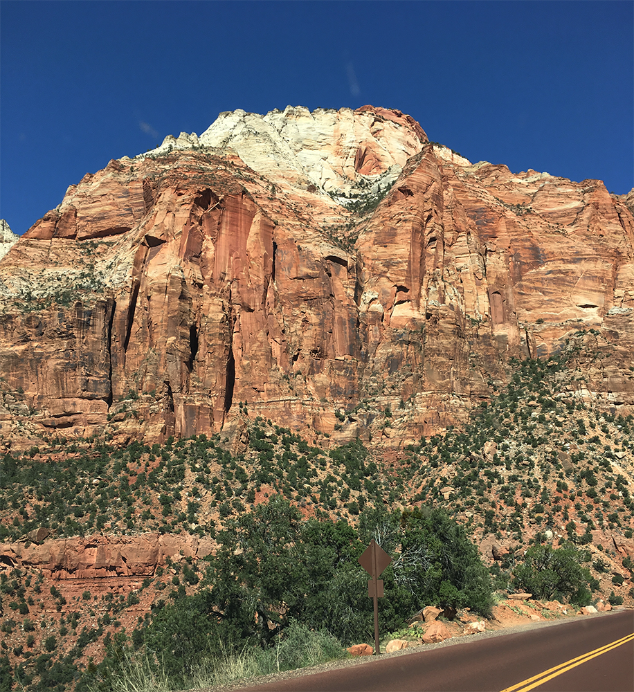 Towering canyon walls along the Zion National Park scenic drive in Utah