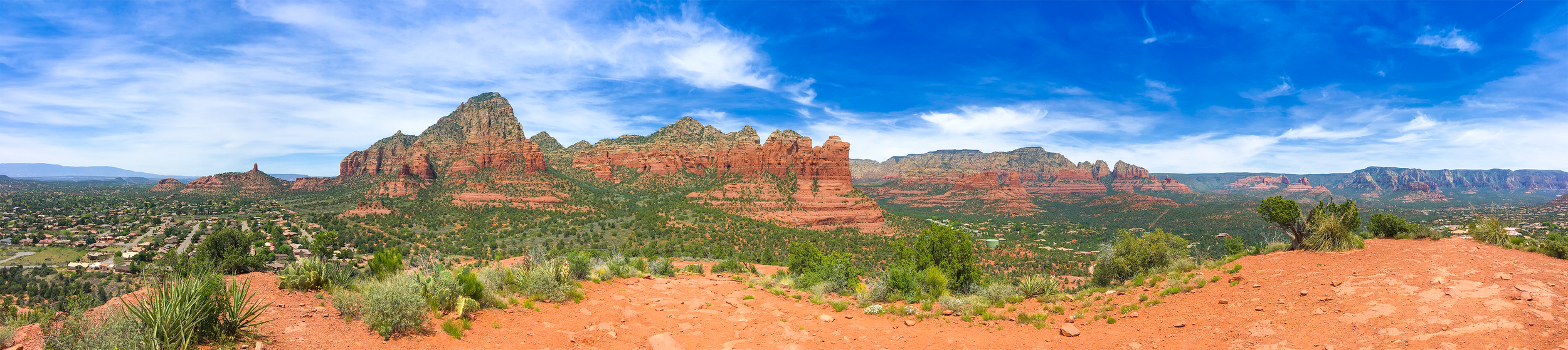Scenic overlook of Sedona Arizona showing red rock formations and desert landscape during a Southwest road trip