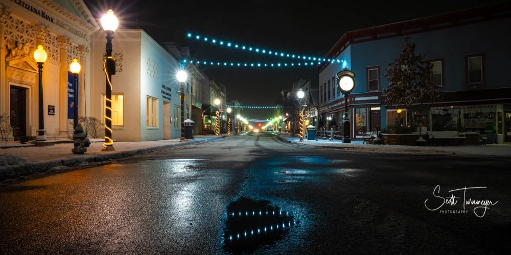 Historic downtown Front Royal Virginia Main Street at night with shops and street lights