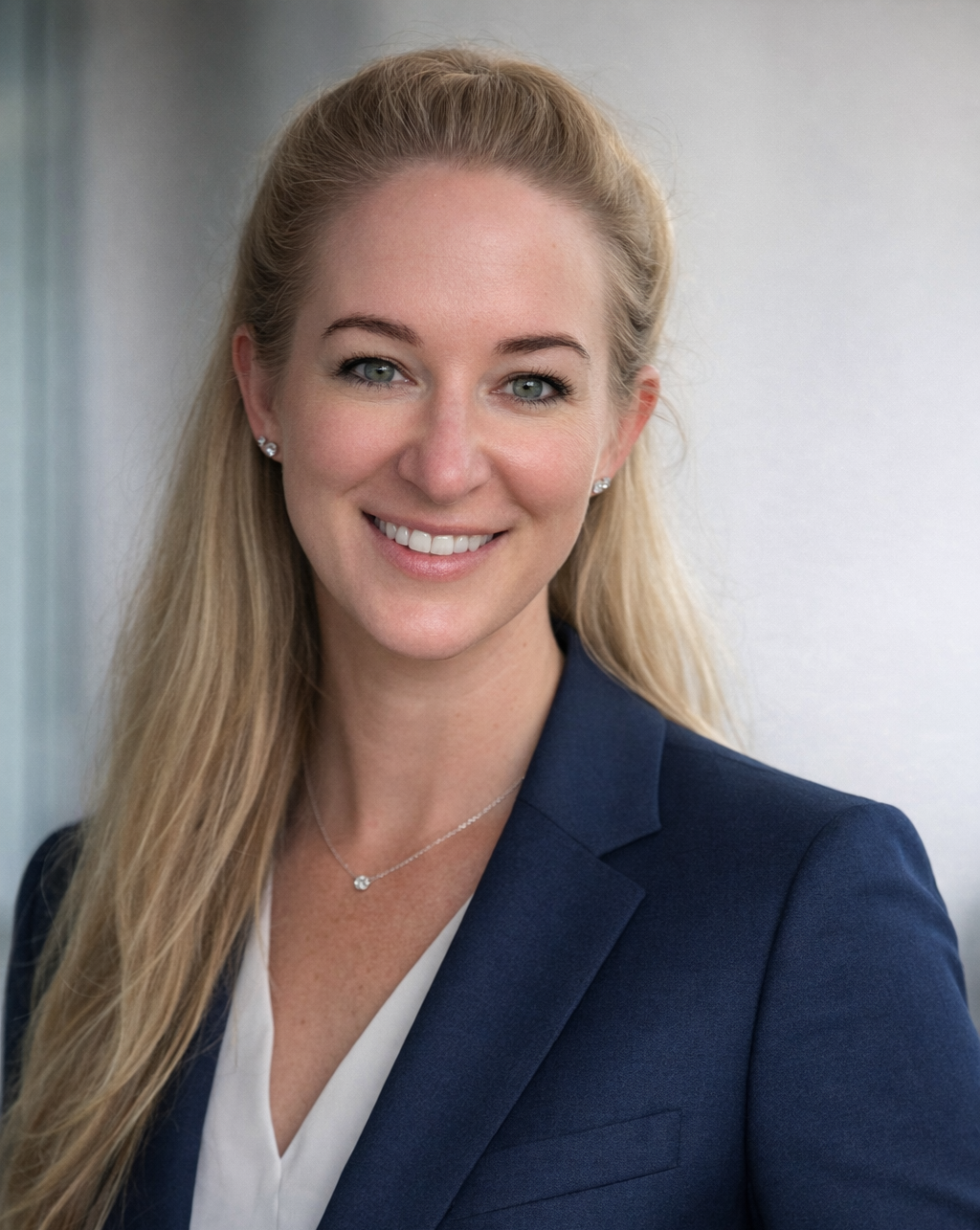 Professional+headshot+with+confident+smile.png