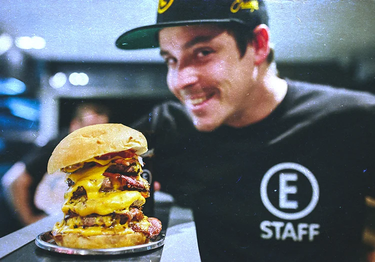 Look at the size of that dim sim shaped head. Pretty big burger too I guess.