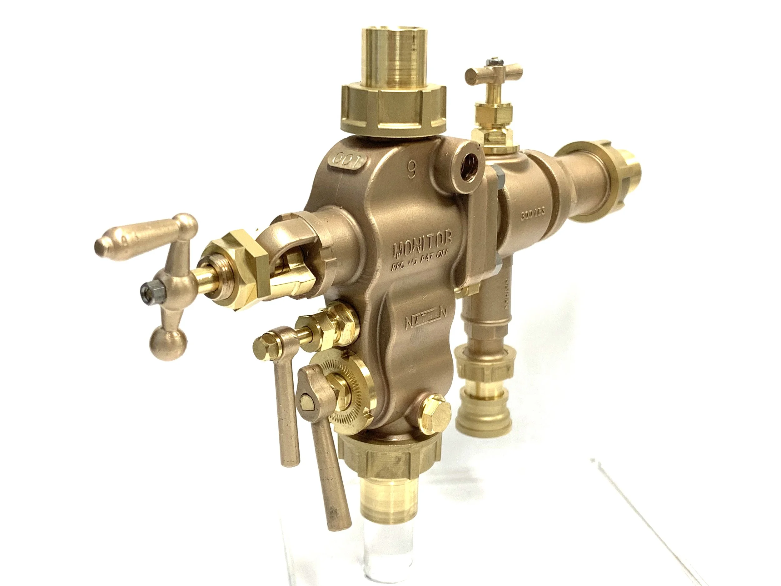 From top to bottom is the steam valve, primer valve, and water valve.