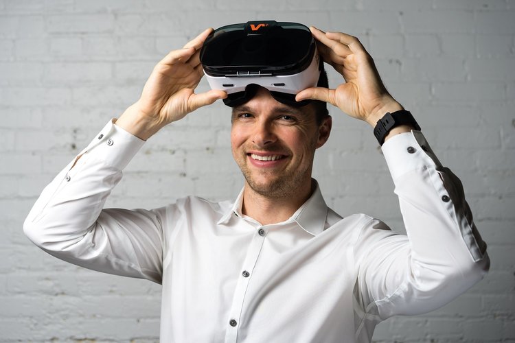 Michael Montgomery - Calgary, Alberta. Wearing a real estate virtual reality headset. 