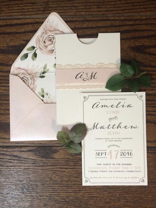 Amelia and Matthew incorporated floral envelope liners with their romantic, blush invitation suite.