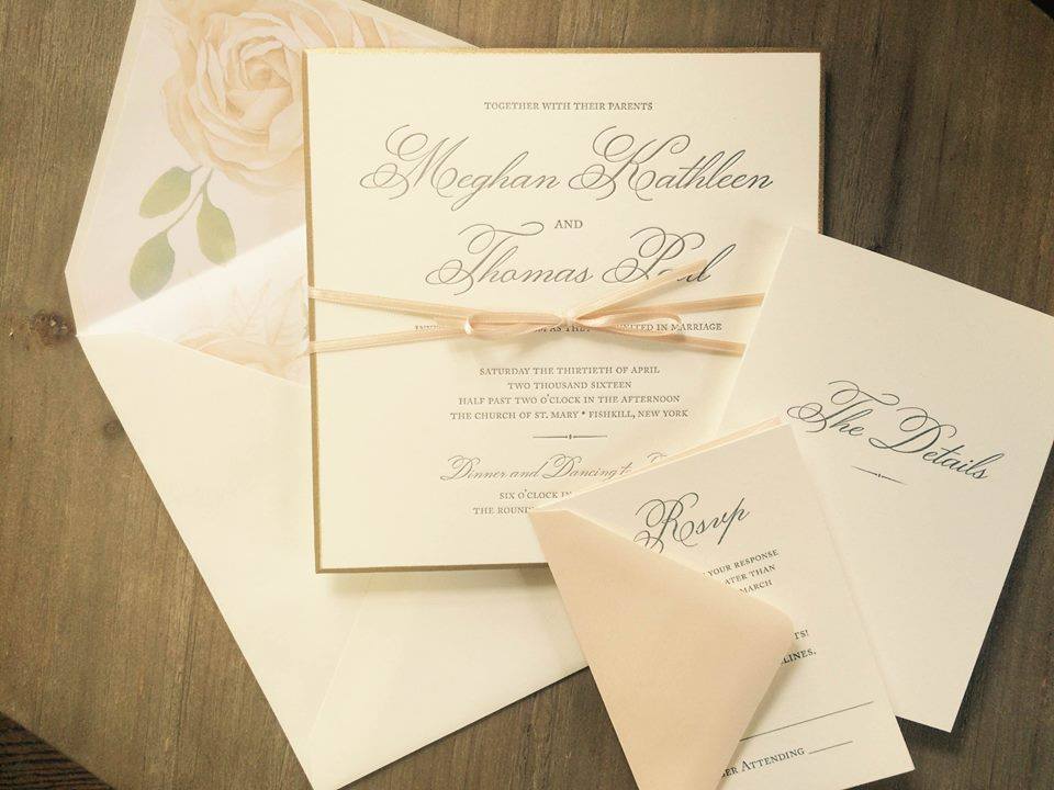 Delicate blush set the tone for Meghan and Thomas' formal affair.