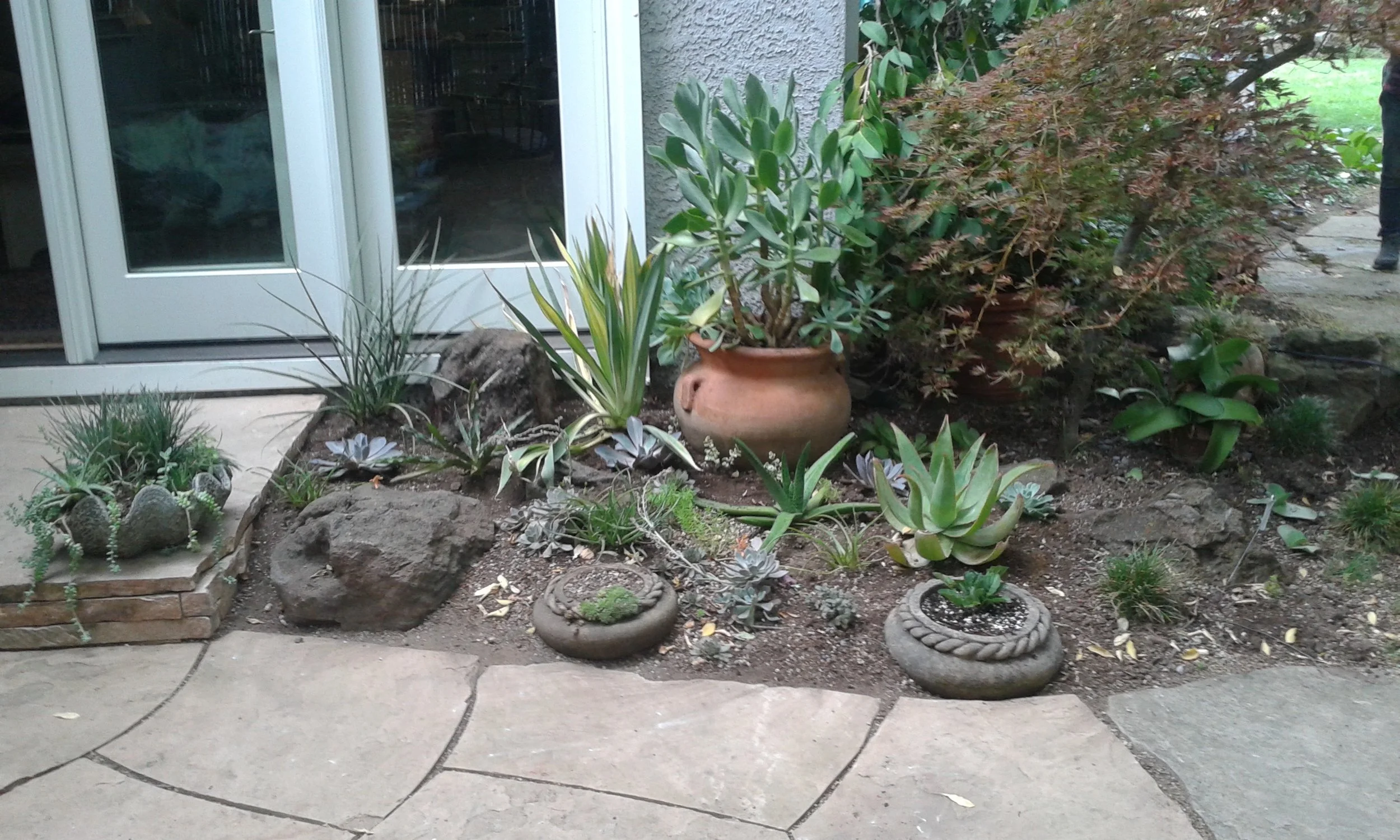 After installation and before the application of rock top dressing