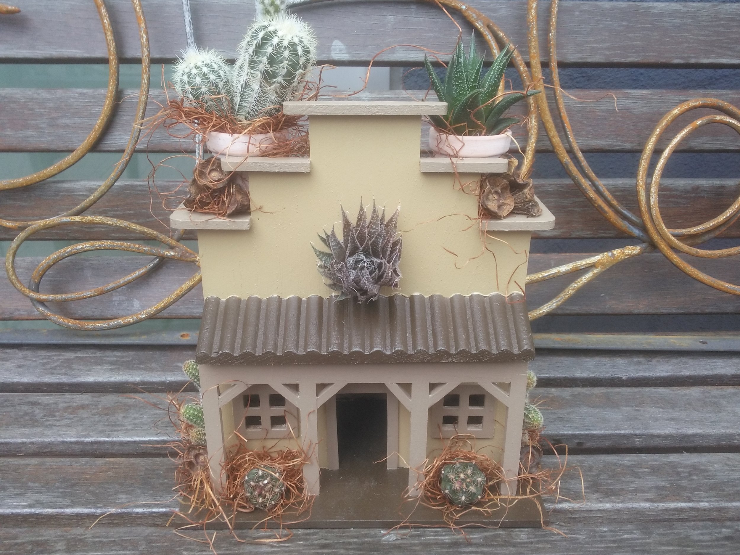Western Birdhouse with Succulents.jpg