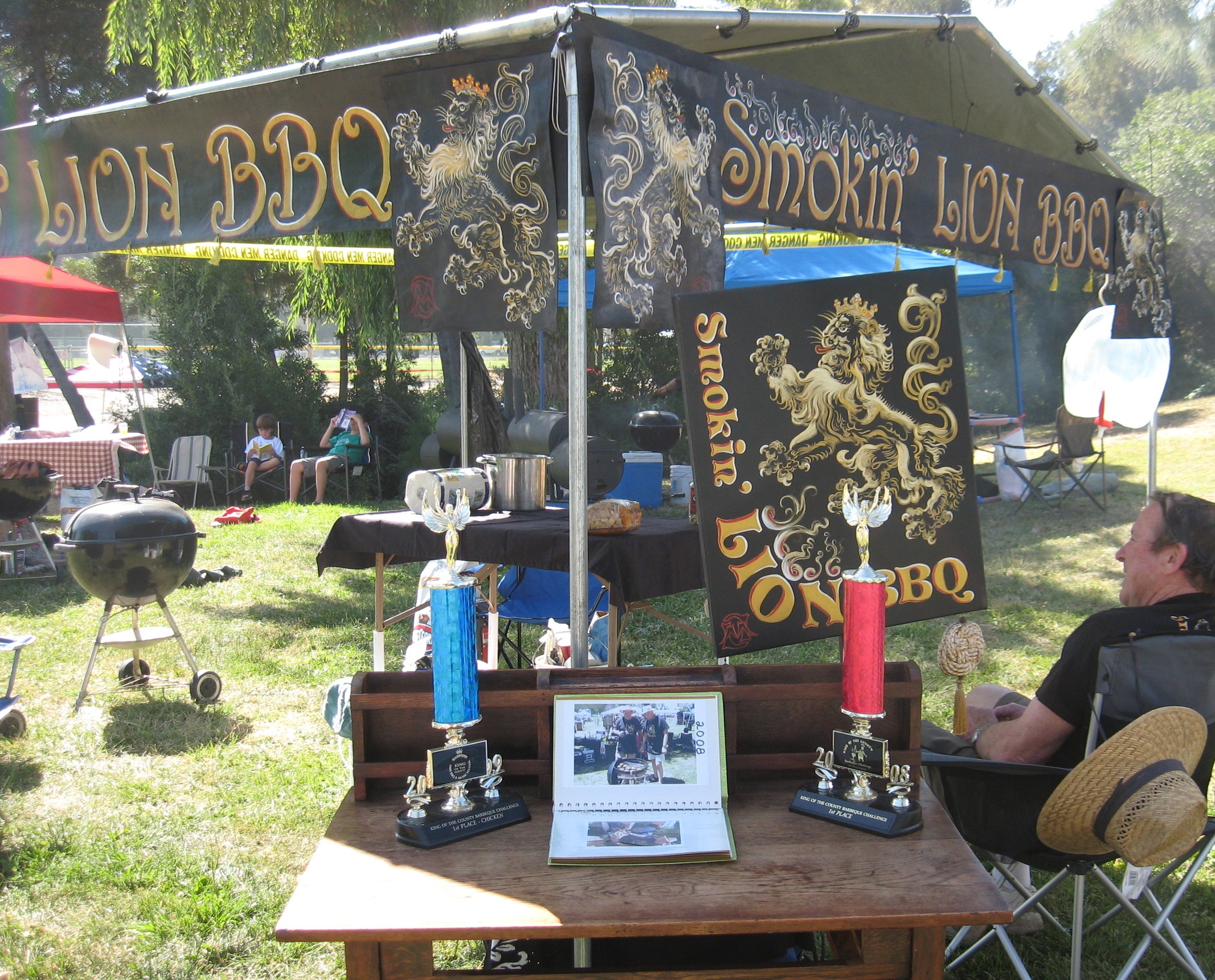 Smokin’ LION BBQ in action at the Martinez King of the County BBQ Challenge. Placed FIRST for Best Booth Design in 2011 competition.