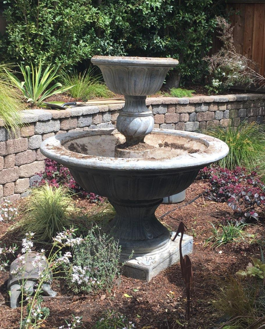 Amason's empty fountain ready for replanting on Sat., April 6, 2019.jpg
