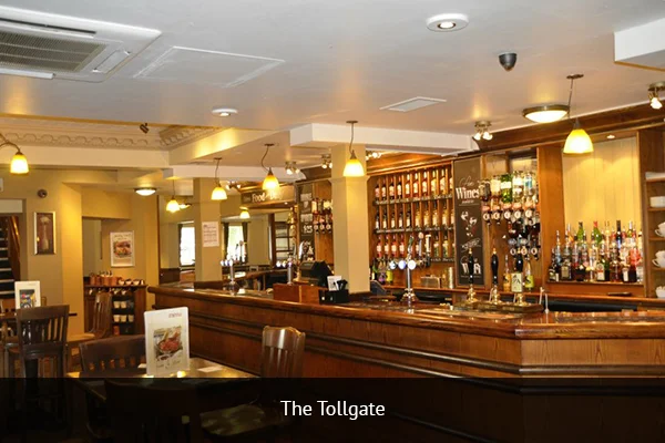 THE TOLLGATE | +44 161 312 2308 Tollgate right across from Metrolink Station and about a 10-minute walk from Old Trafford. The place is always bustling on game days. Address: Seymour Grove, Old Trafford, Manchester, M16 0TG