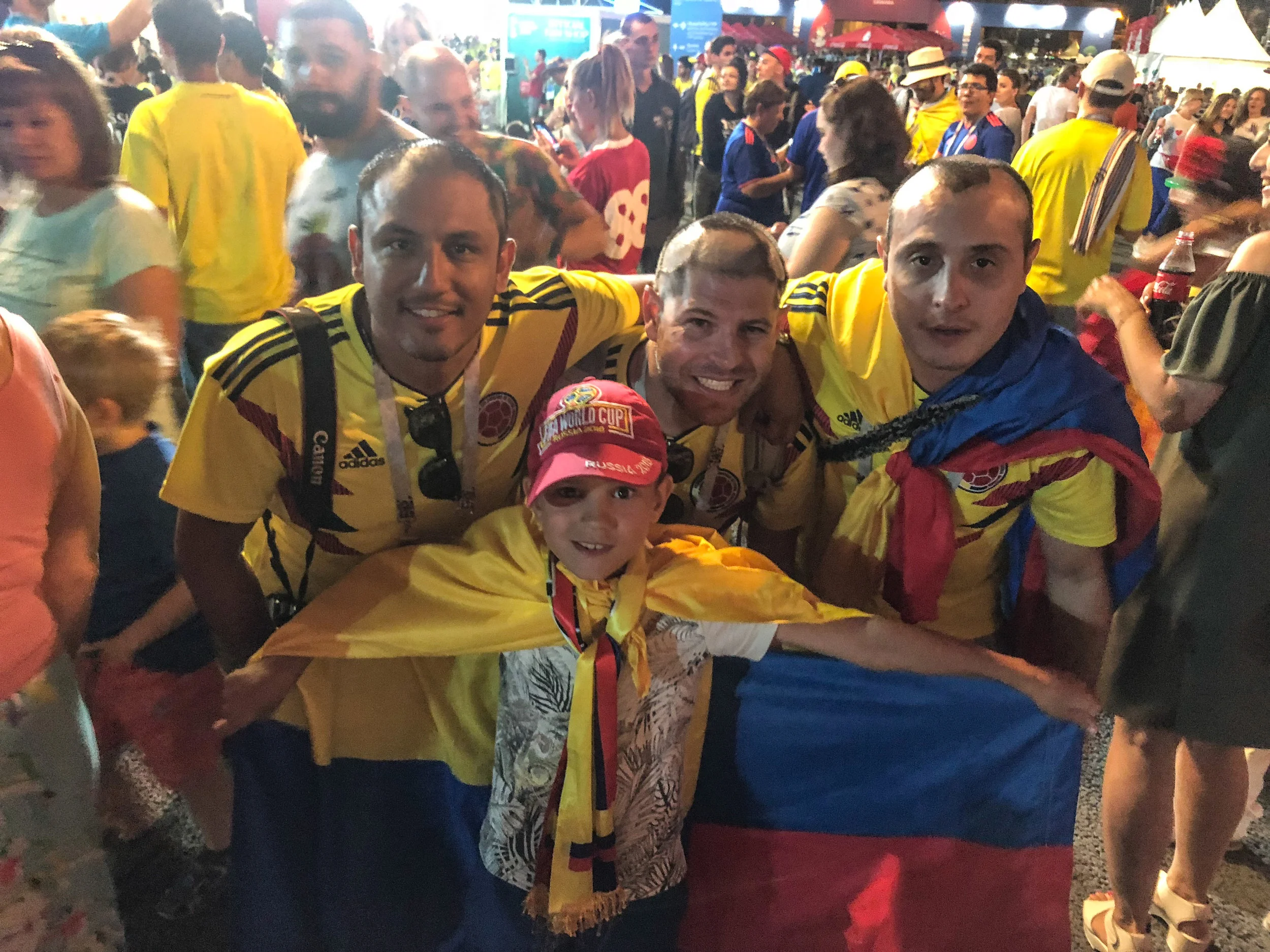 With the little Zhenia, the 8-year old Russian kid that we meet at the Fan Fest. Read more about his story here .