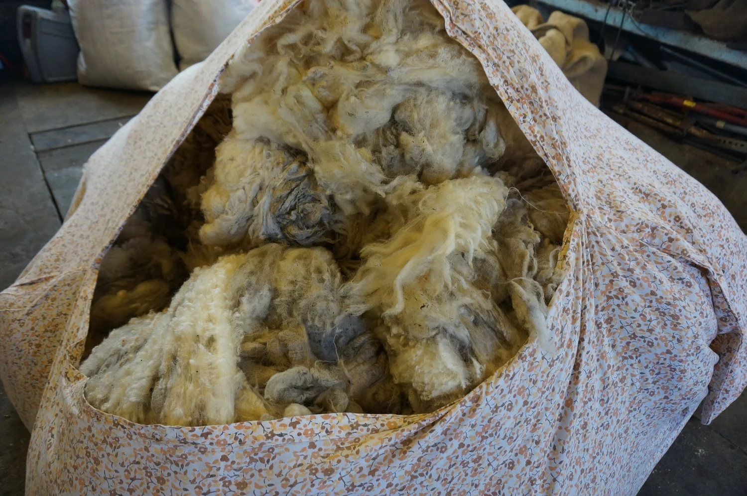 Fleeces waiting to be sorted (in an old quilt cover!)