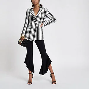 Asymmetric frill hem trousers
