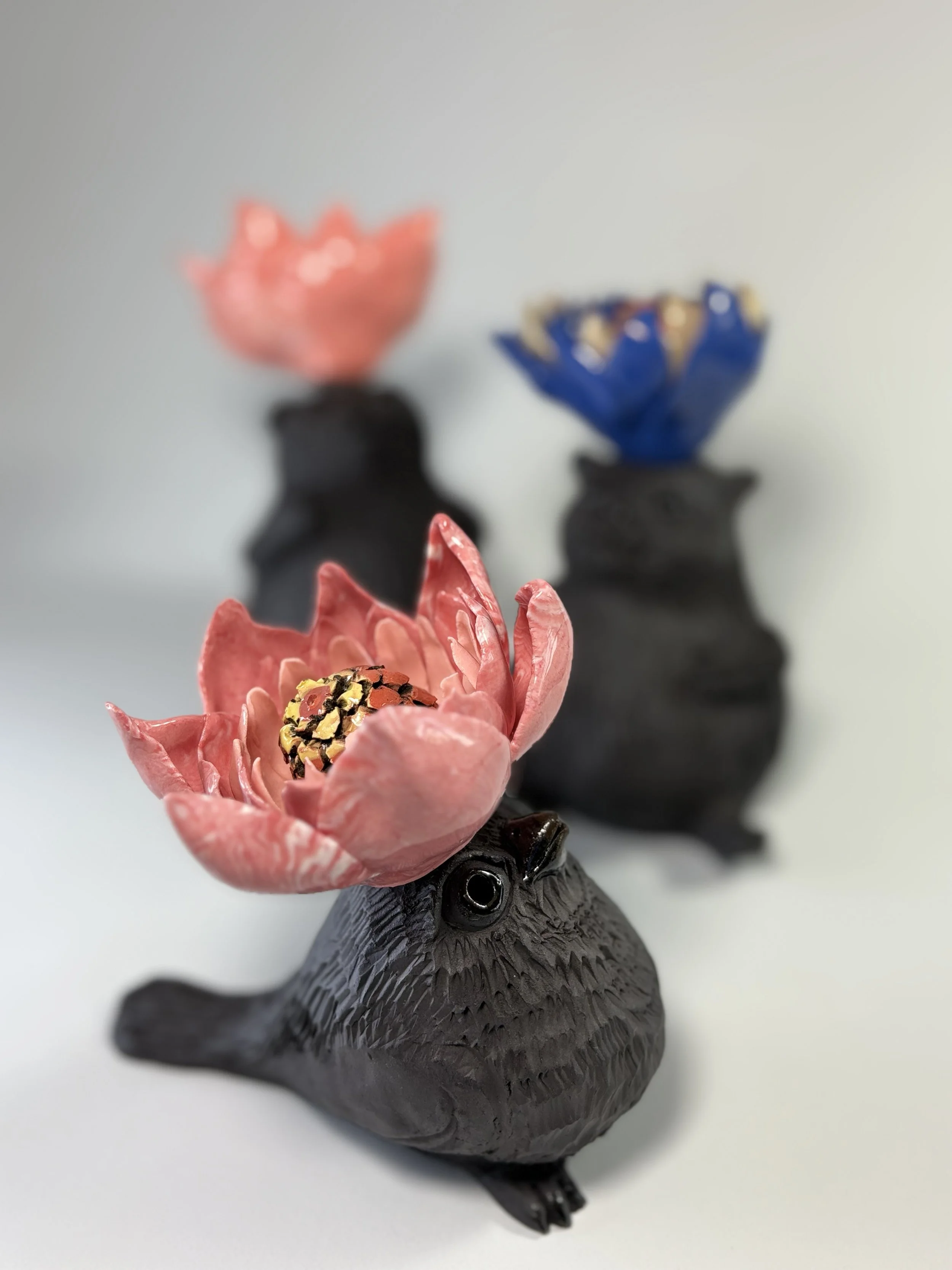 TERRE NOIRE porteurs oiseaux.jpg