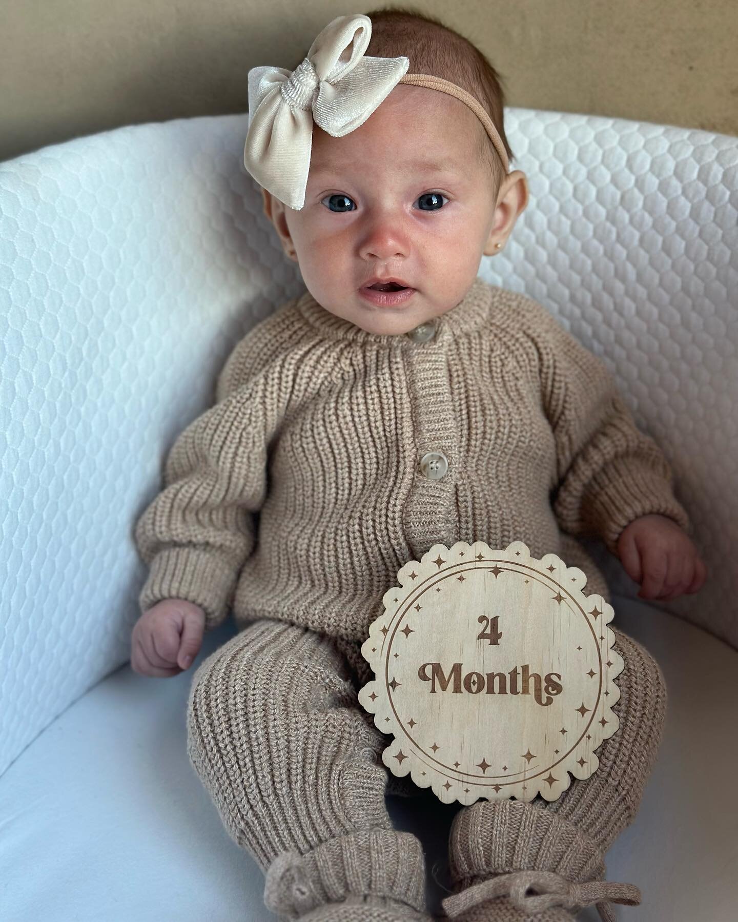 4 months : : Time is flying and we are soaking up every second with her. 

&bull;first flight 
&bull;first time at the beach 
&bull;first time seeing where mom and dad got married 
&bull;first hawaii trip 
&bull;started making sounds and giggling 
&b