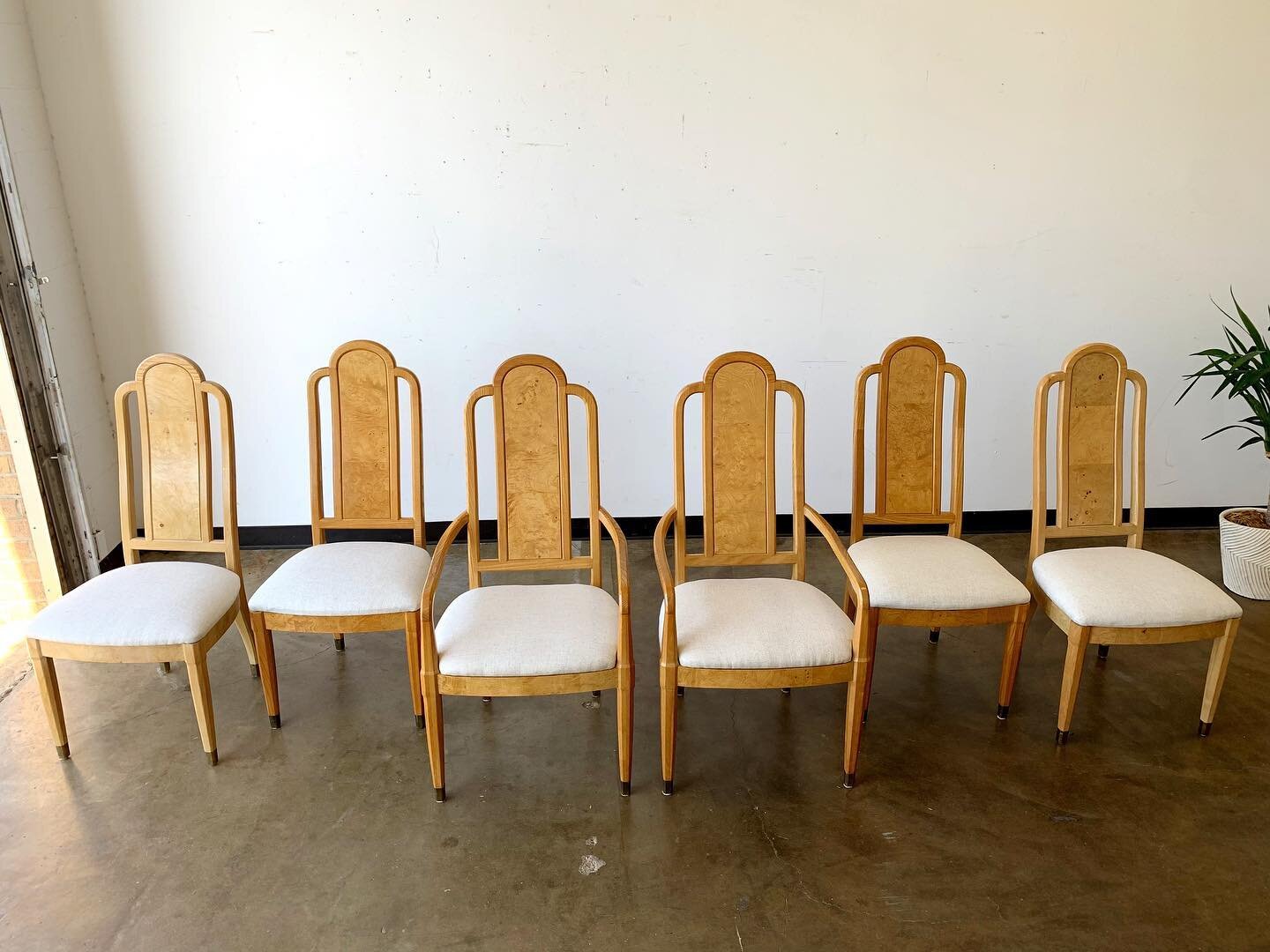 BURL is Our Thing and Always Will Be! 

Vintage Mid Century Arched Burl Dining Chairs by Henredon! 4 side chairs and 2 arm chairs. Stunning tiered arches with Burl inlay on the front and back! Brass capped feet and more Burl around the seat. Newly up