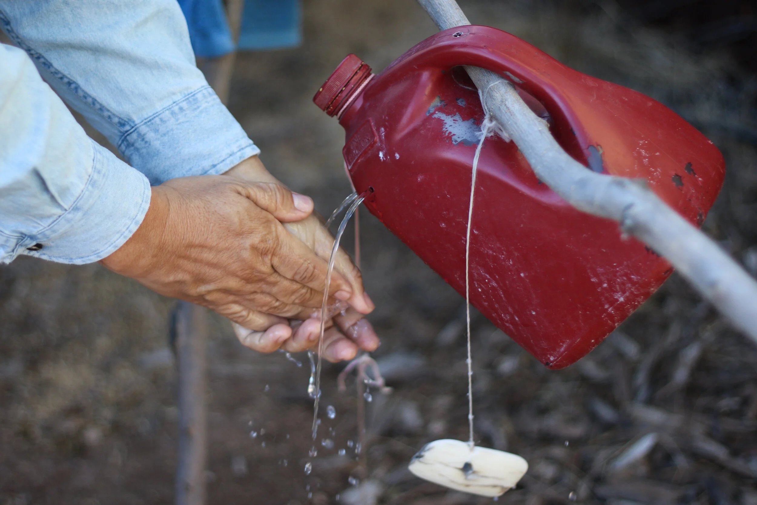  Joaquín Murrieta, an ecologist, demonstrates a water conservation technique at the Watershed Management Group’s headquarters in Tucson, Arizona. The headquarters are 100 percent rainwater-dependent. (Independent) 