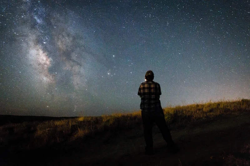 John is seen looking at the Milky Way Galaxy in Western Wyoming.