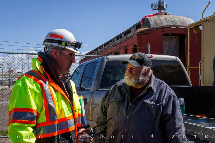 Ed Dickens (Senior Manager of Heritage Operations) and the owner of the equipment discuss the plans on how the move will take place to its new home in Granby.