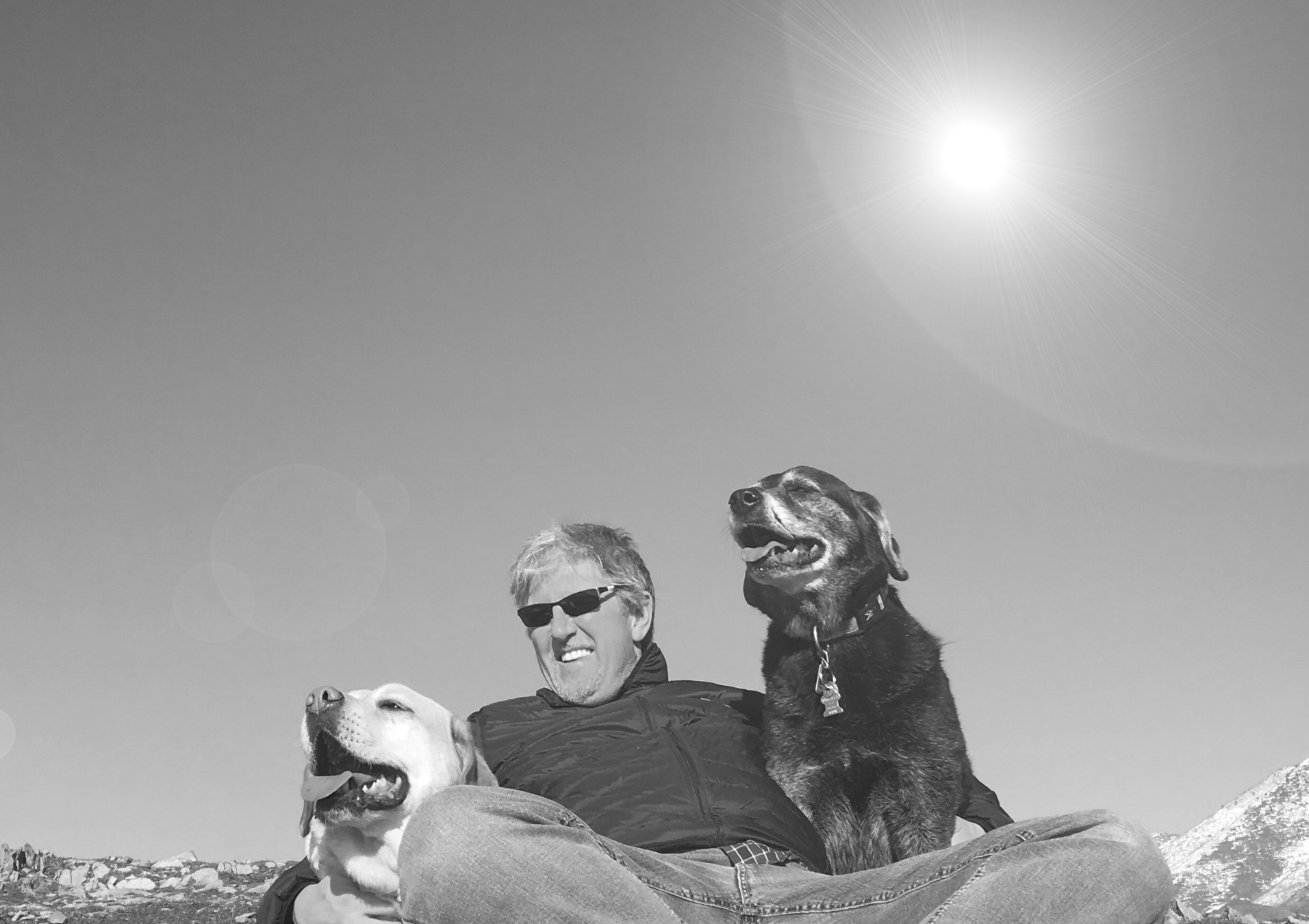 B&W John And Dogs.png