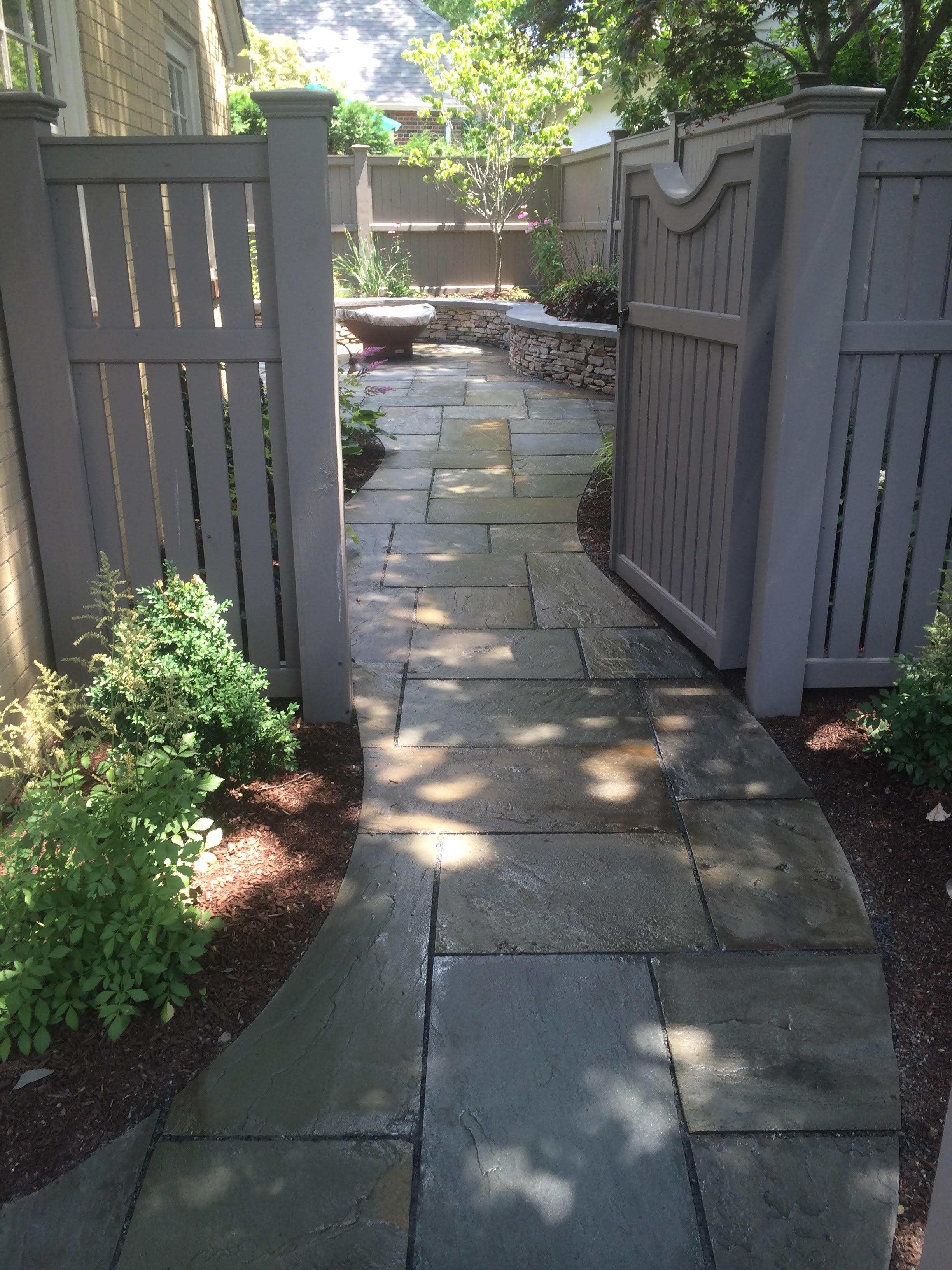 Landscape design with walkway in East Greenwich, RI