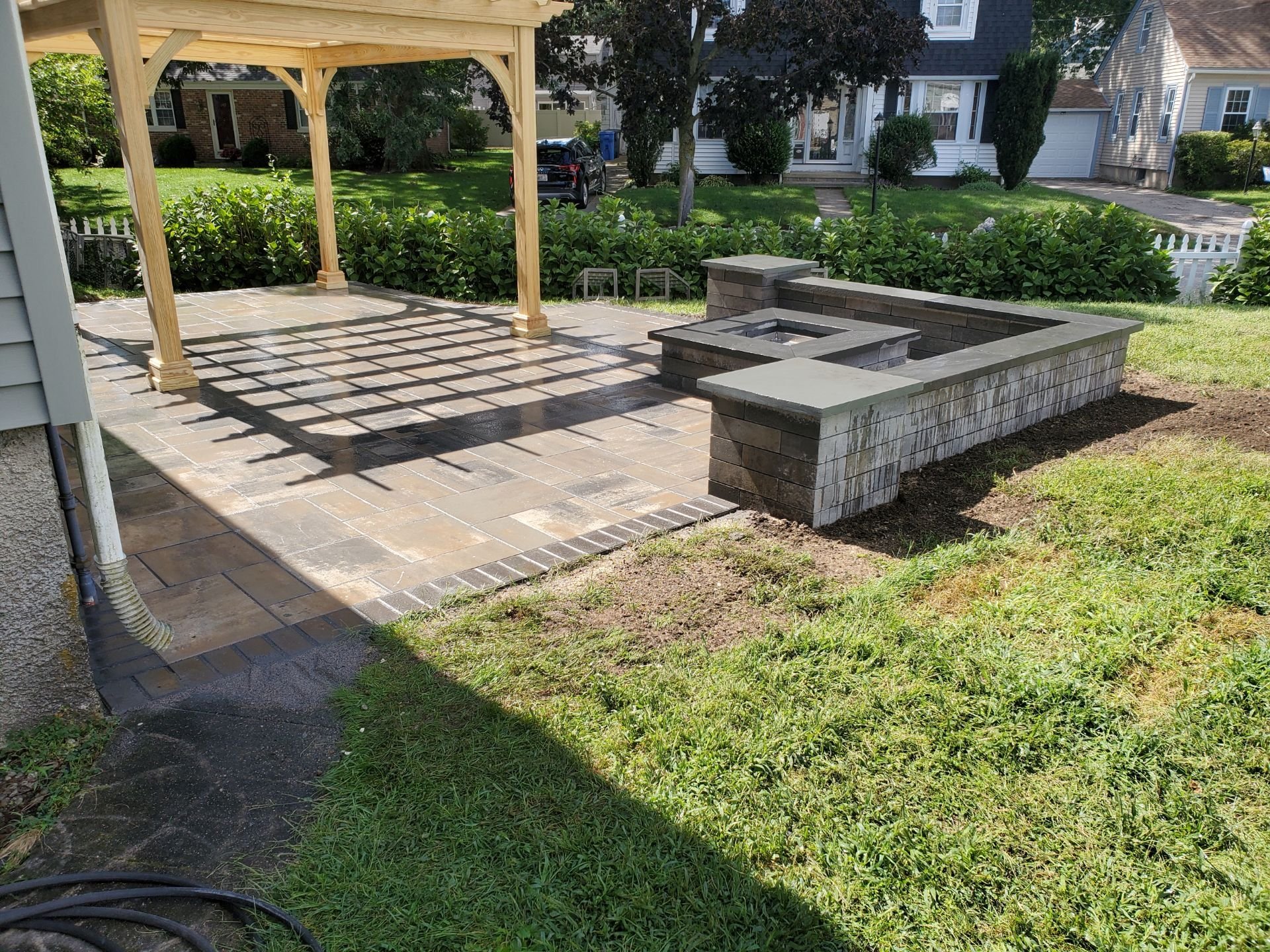 Enjoy a Cozy Landscape Design by Including a Fire Pit in the West Greenwich, RI Area