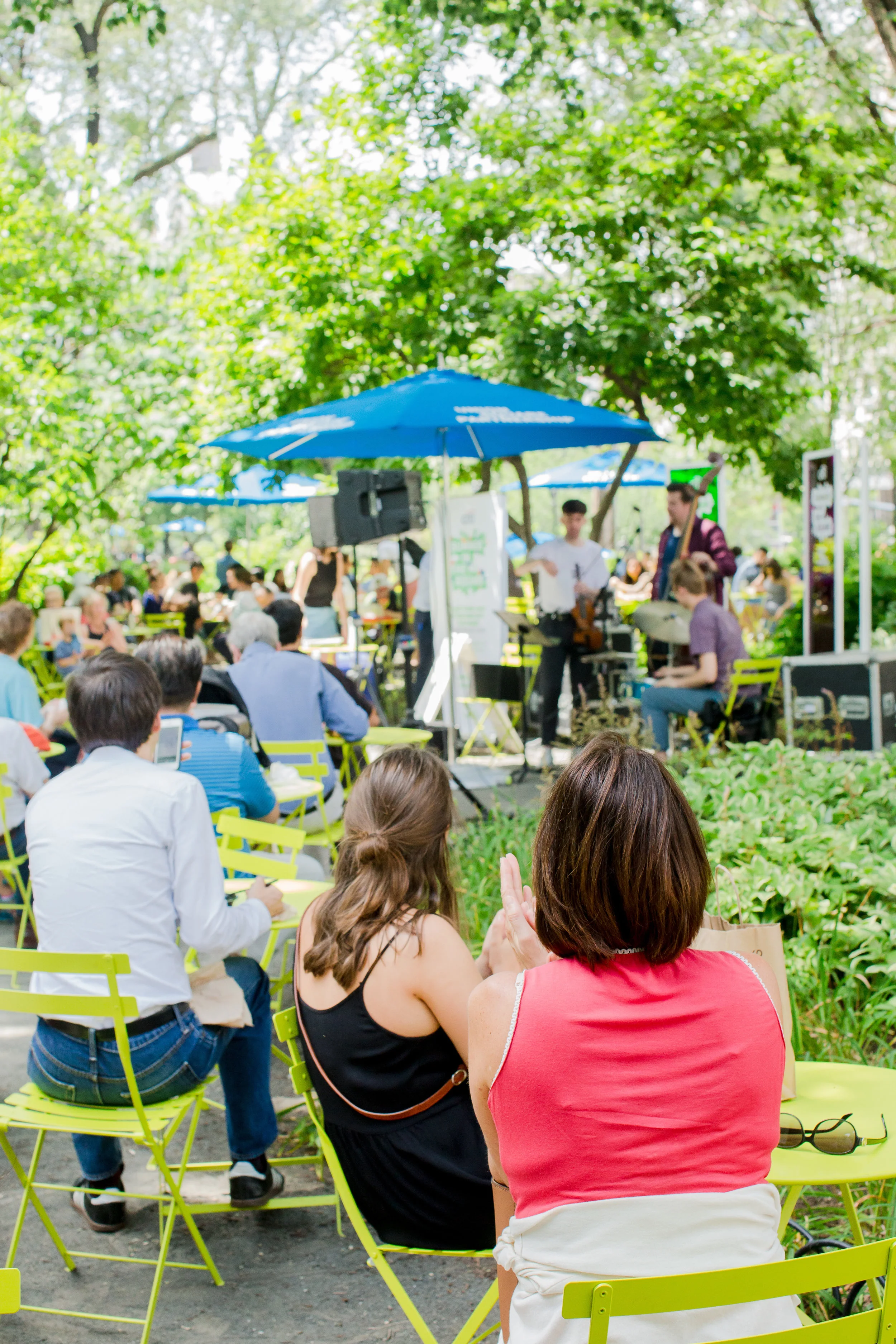 Lunch goers enjoy free jazz concerts in the West Side Seating Area at Summer in the Square. 