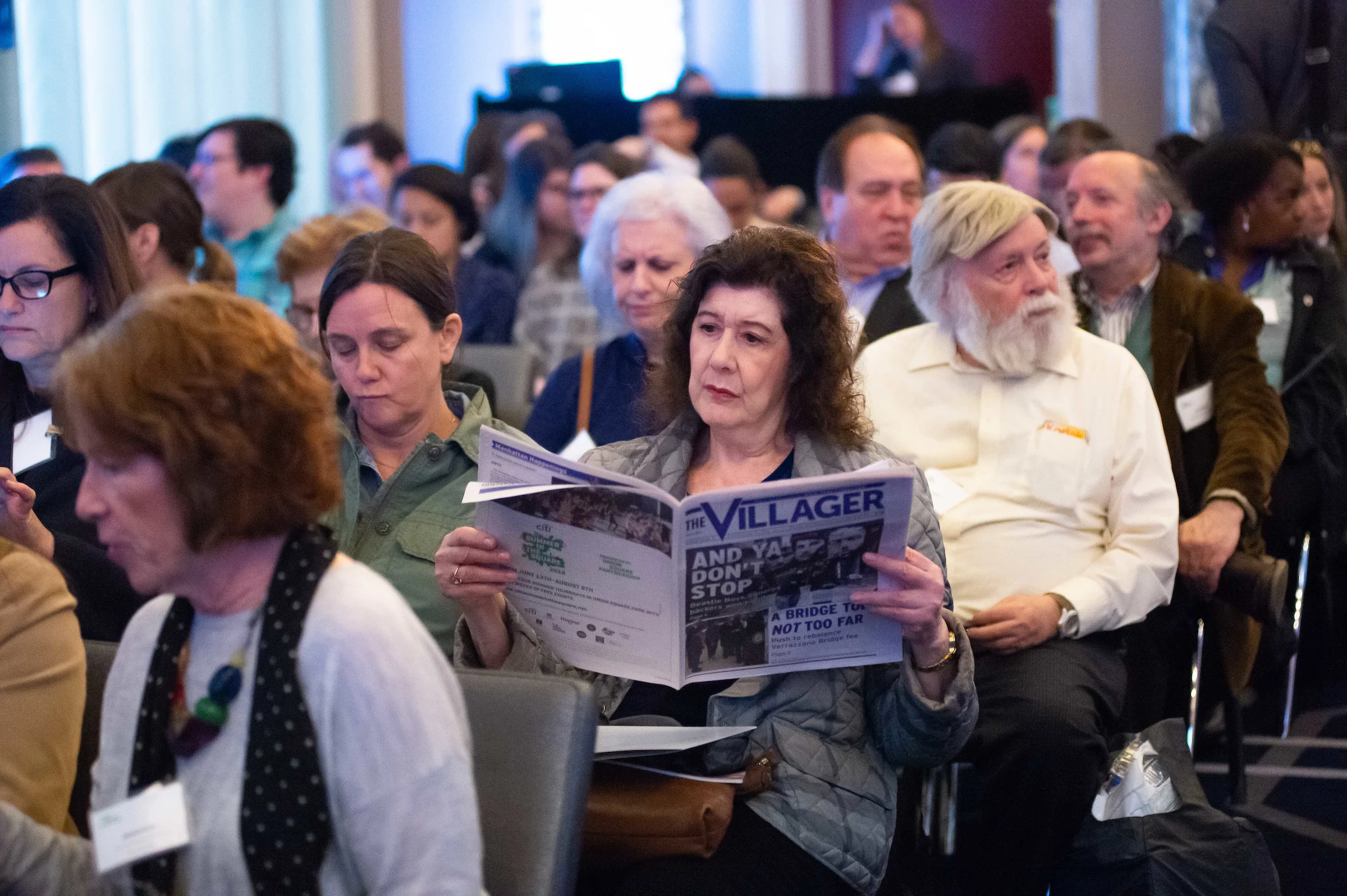 Attendee reads The Villager’s 2019 Salute to Union Square