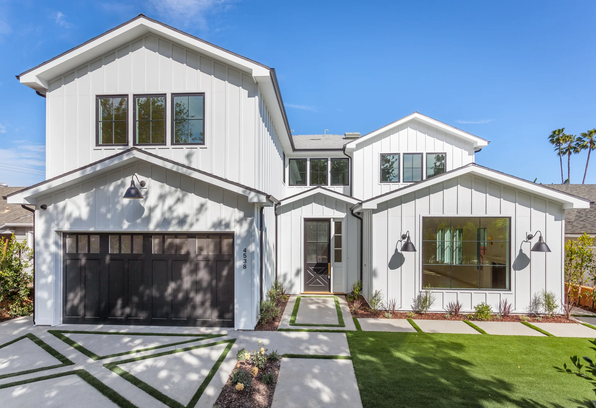 BEEMAN | STUDIO CITY Stylish Modern Craftsman. Board and Batten facade with clean contemporary streamlined detailing. Exquisite finishes throughout entire home with exceptional workmanship and unparalleled quality for this style construction.Indoor-outdoor entertaining featuring a pristine saltwater pool.