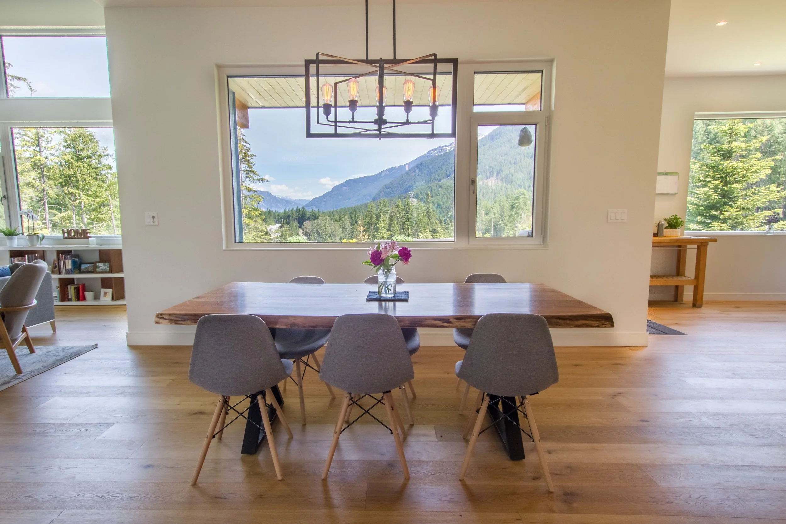 Large, custom windows maximize light and mountain views in this custom Whistler home.