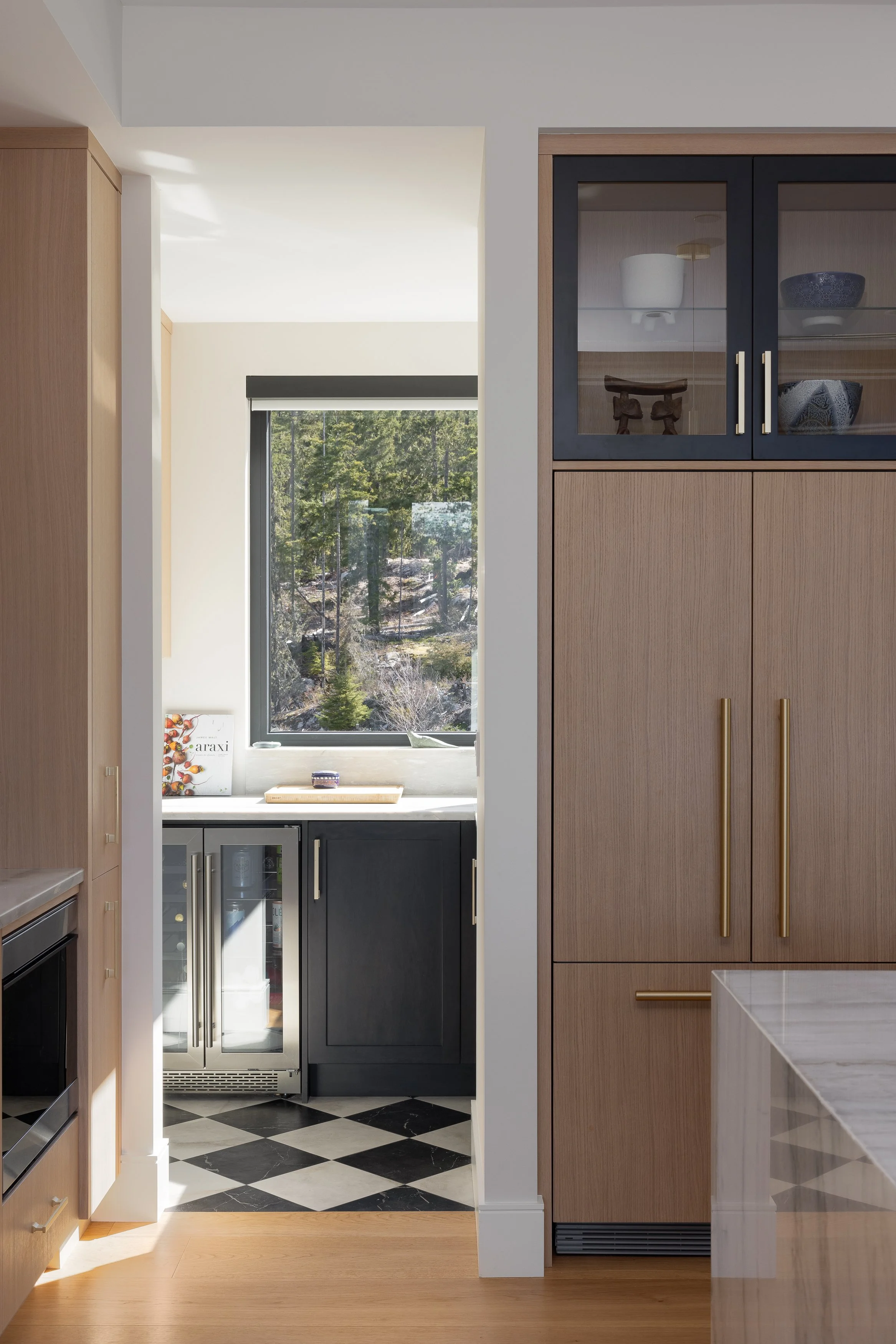 Custom millwork in this luxurious kitchen and butler's pantry