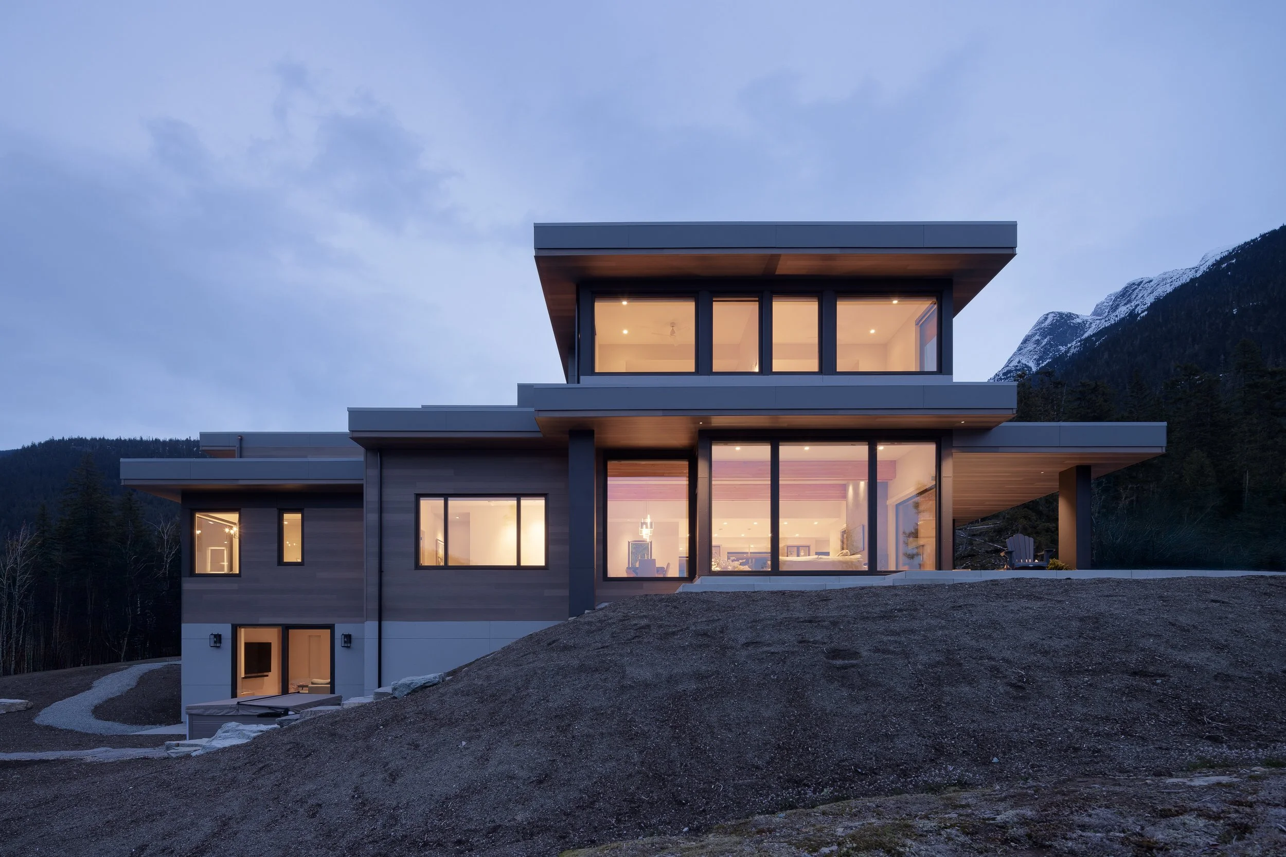 Custom home in Wedgewood Whistler with modern exterior and large windows.