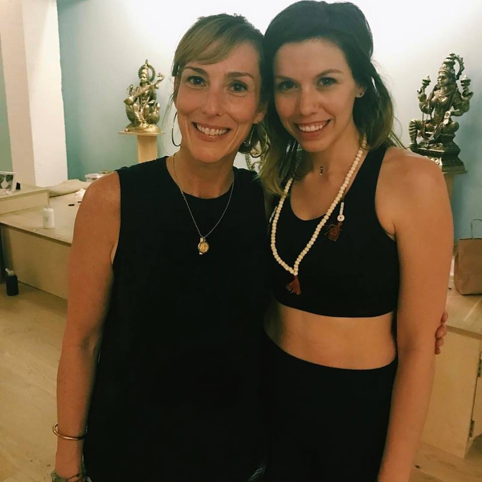 Sam with her teacher Stephanie Snyder at Love Story Yoga in San Francisco.